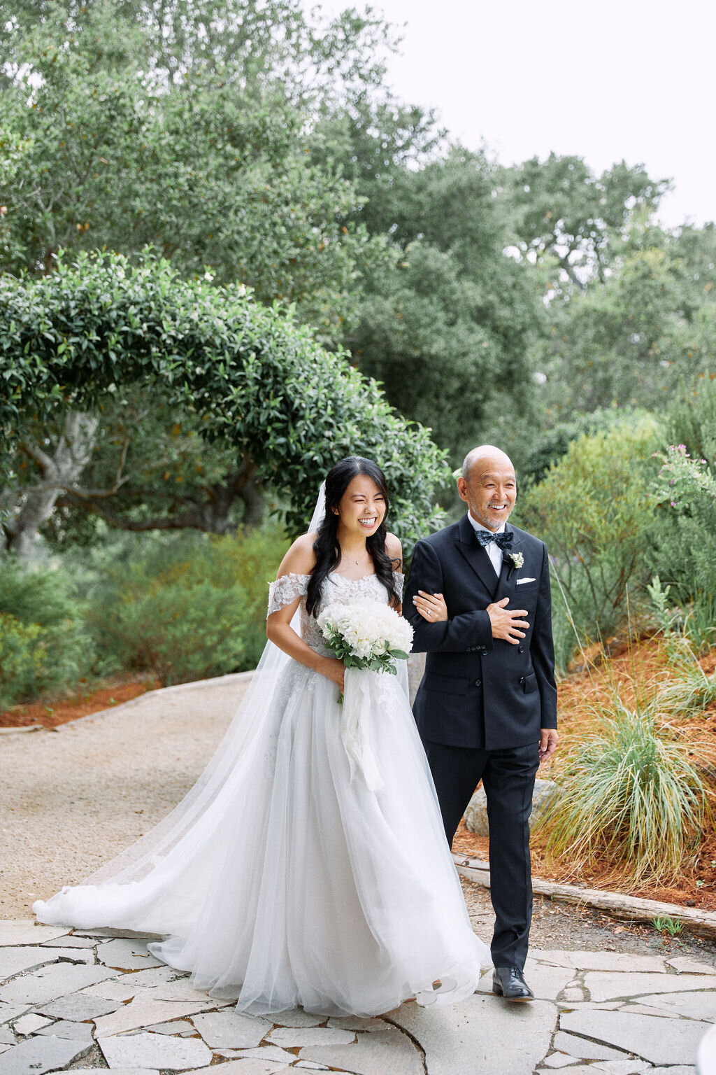 bride and father walk down aisle wedding ceremony ventana big sur