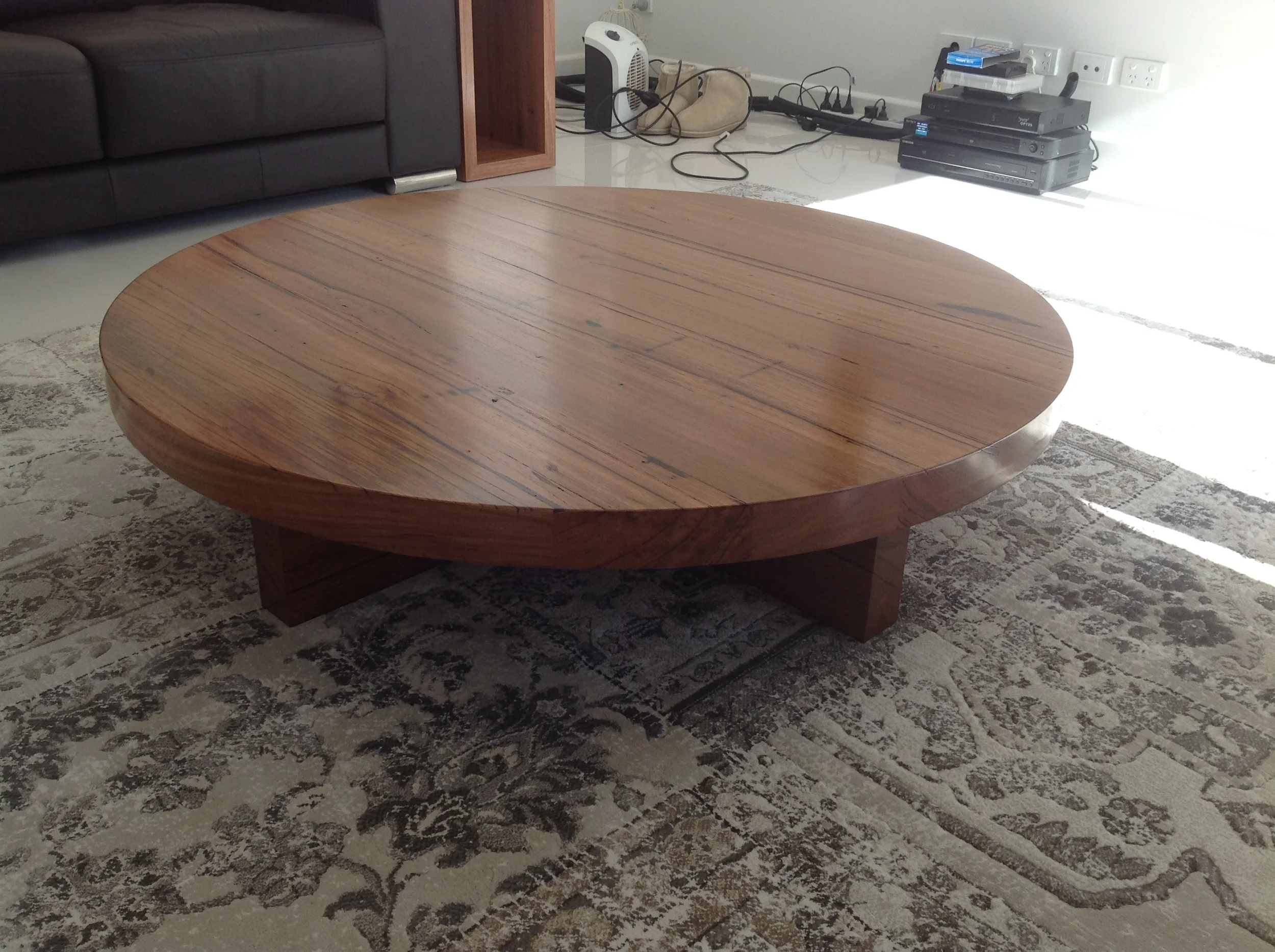 Round recycled hardwood coffee table