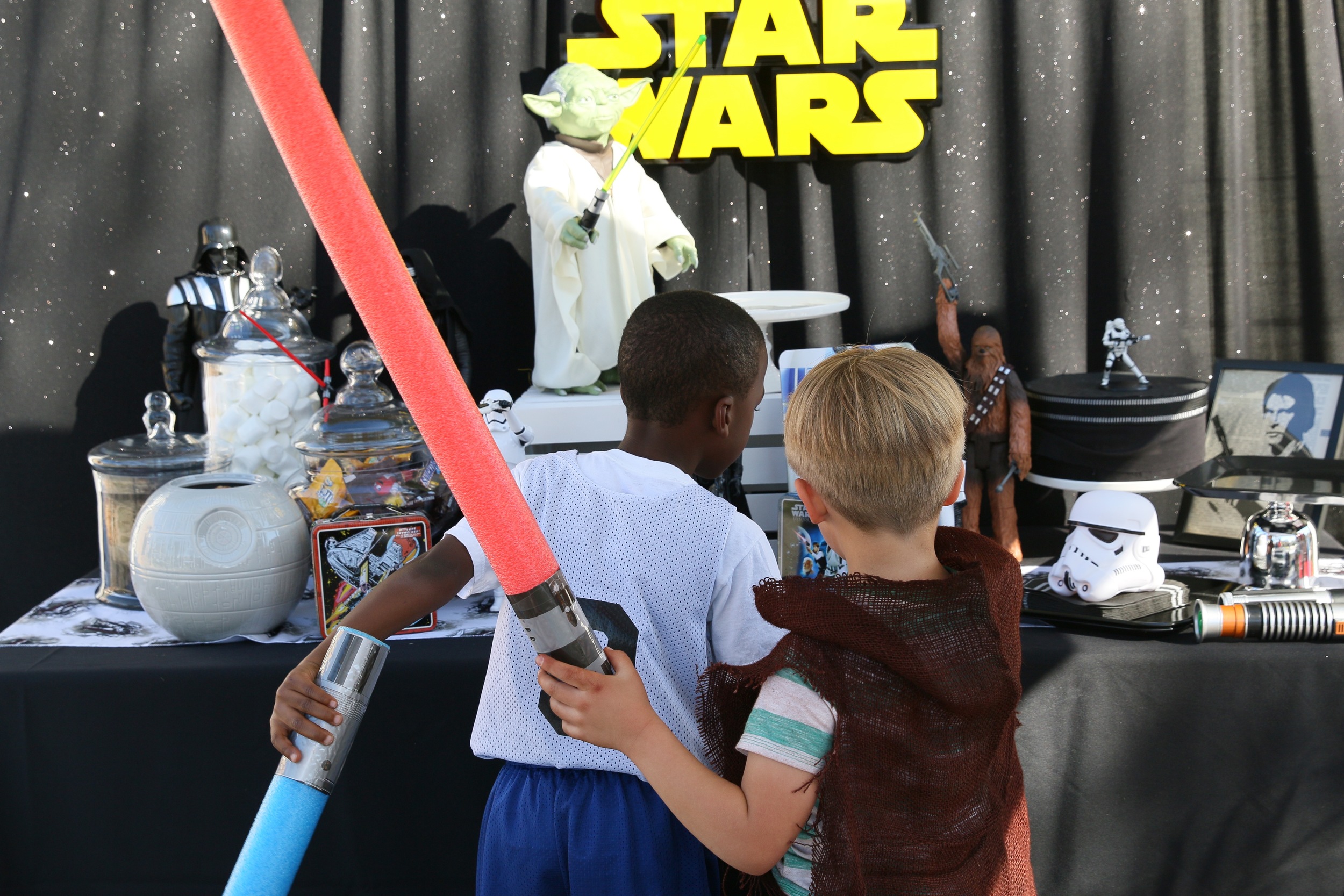 Copy of This Star Wars party rental collection will awaken the force in all party guests! Star Wars action figures, signage, linens, and centerpieces are all included to make your party planning si...