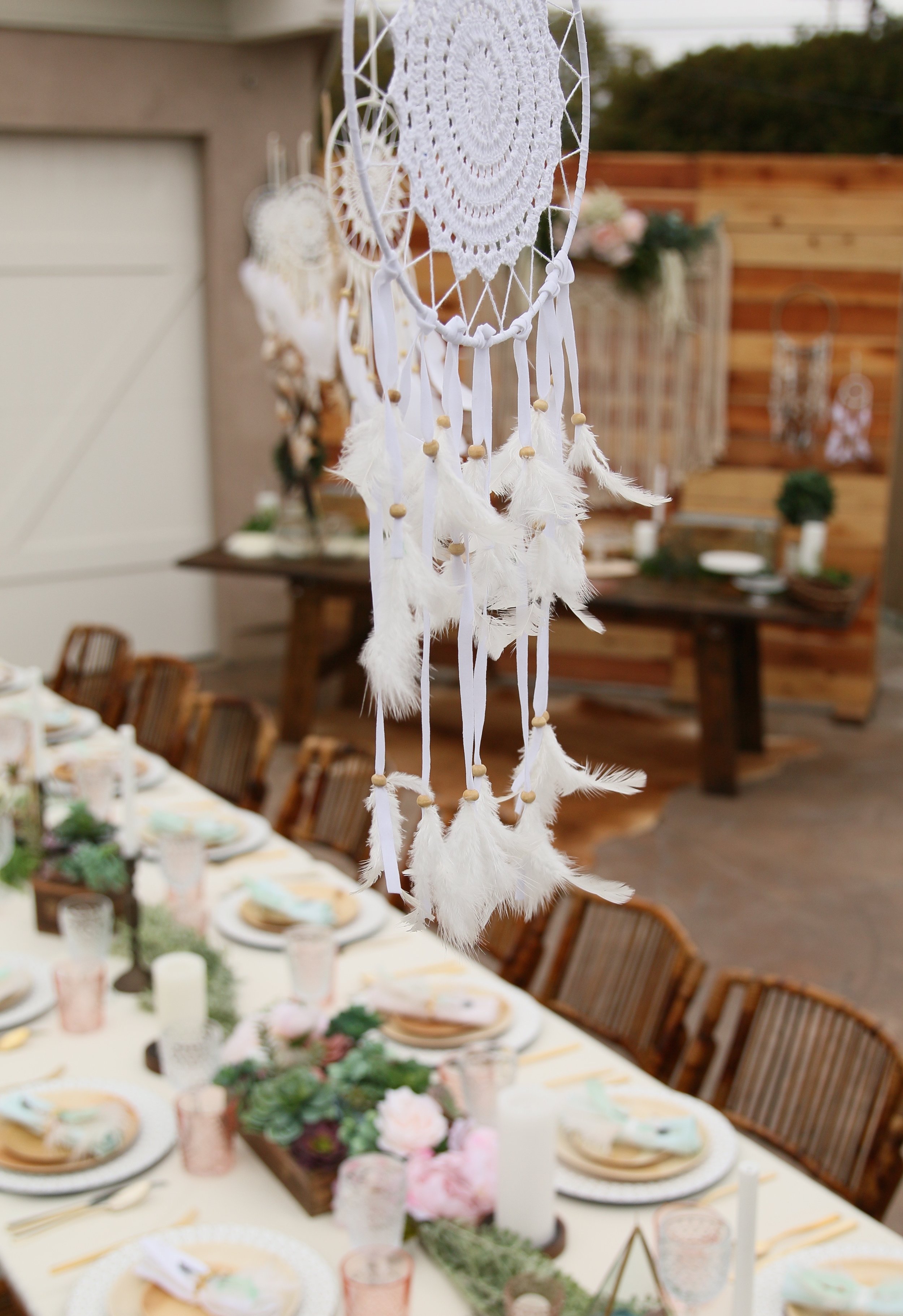 Copy of A gorgeous pre-curated rental collection with succulents, pops of blush, dreamcatchers, and rustic wood accents. Make it yours for your next baby or bridal shower! @inJOYtheParty