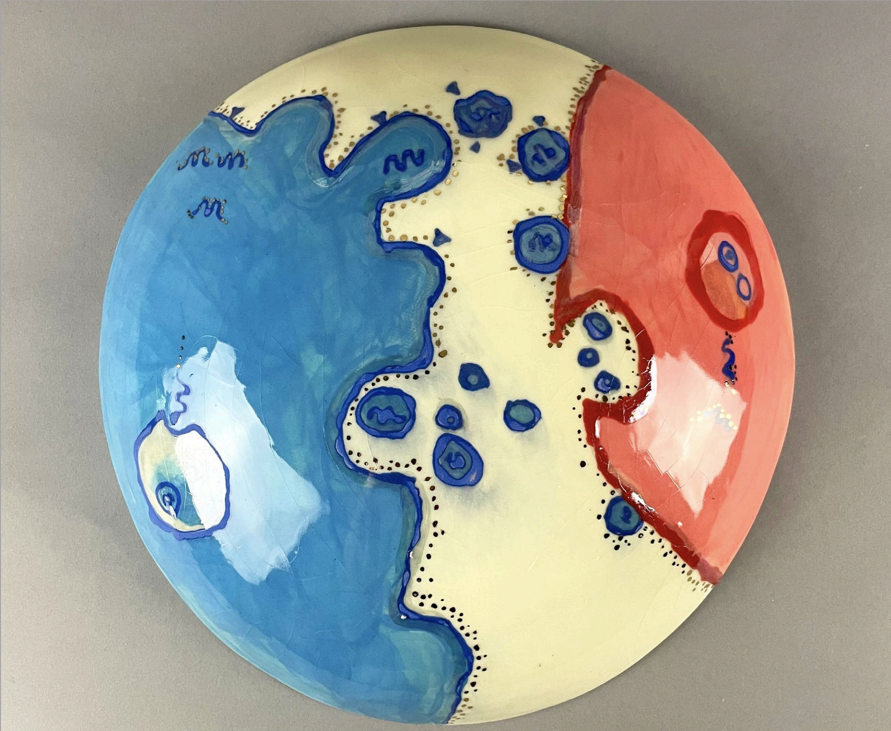 A painting on a clay sculpture representing cell to cell communication