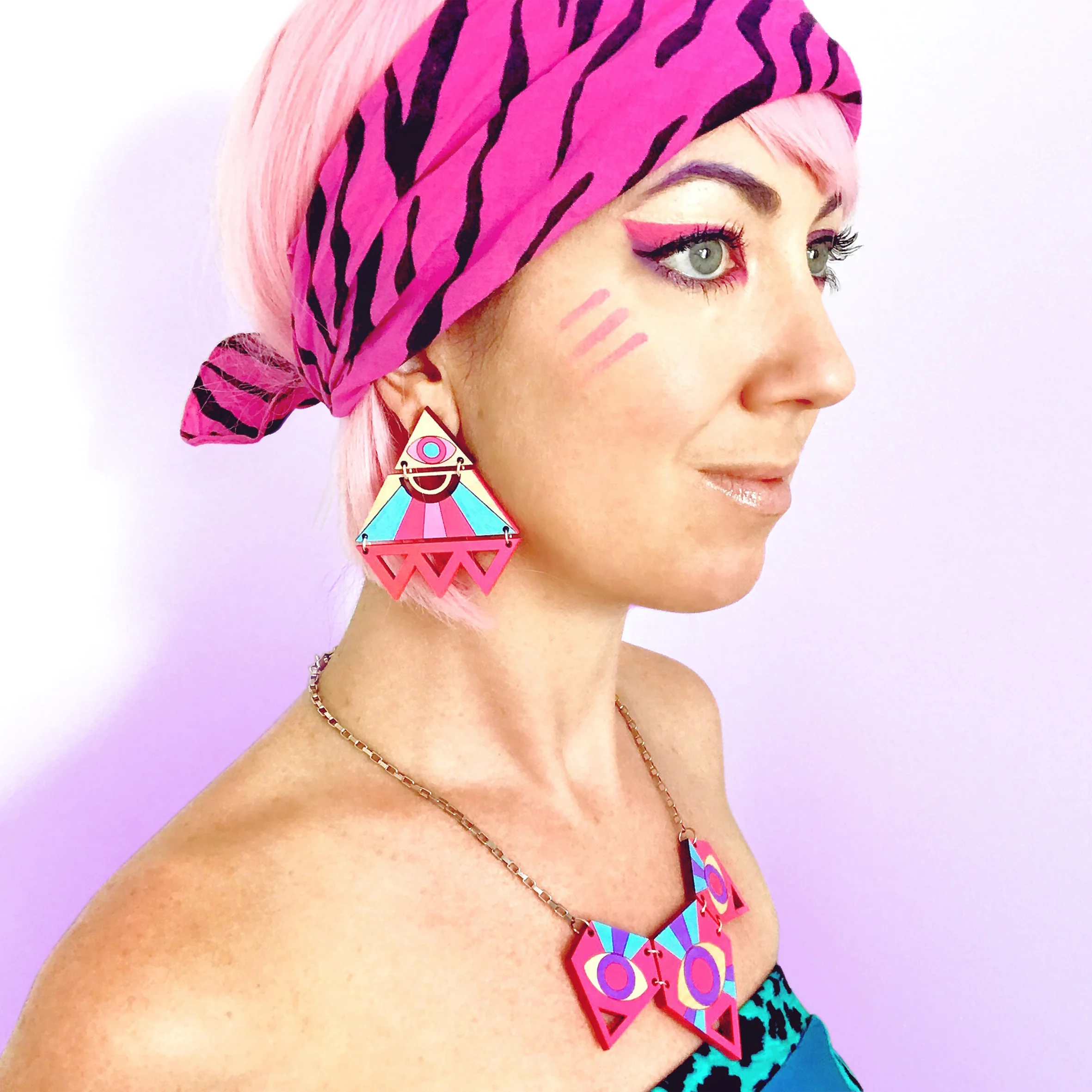 Easy Tiger Designs Festival Jewelry Illuminati Earrings Model 02.jpg