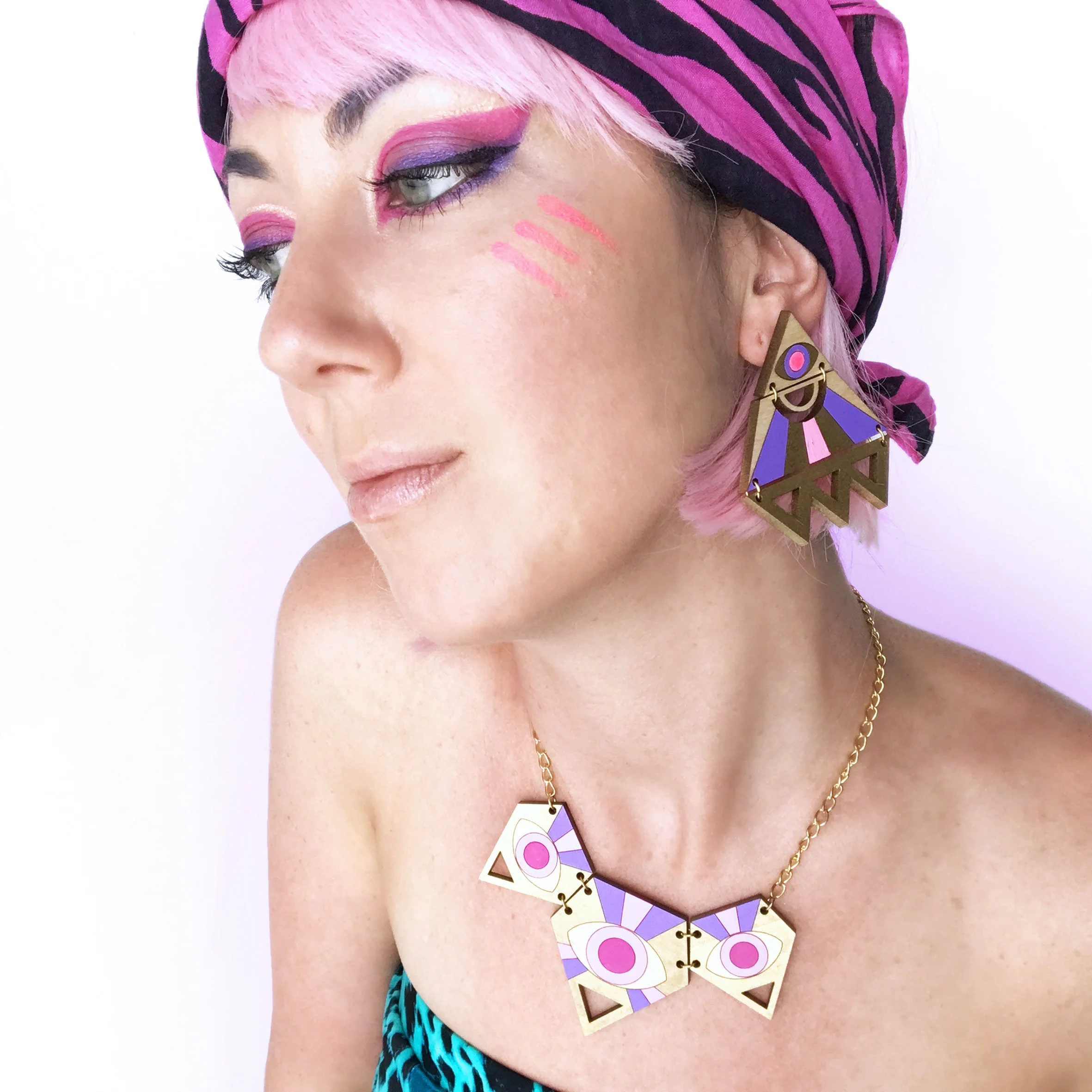Easy Tiger Designs Festival Jewelry Illuminati Earrings Model 03.jpg