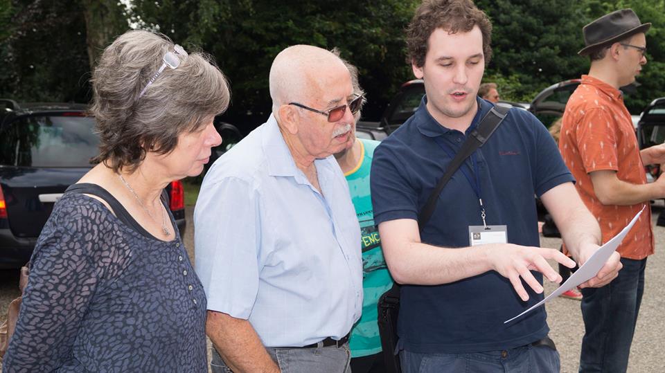 Director Christopher Bevan briefs Seen Ya Rights on the day's filming