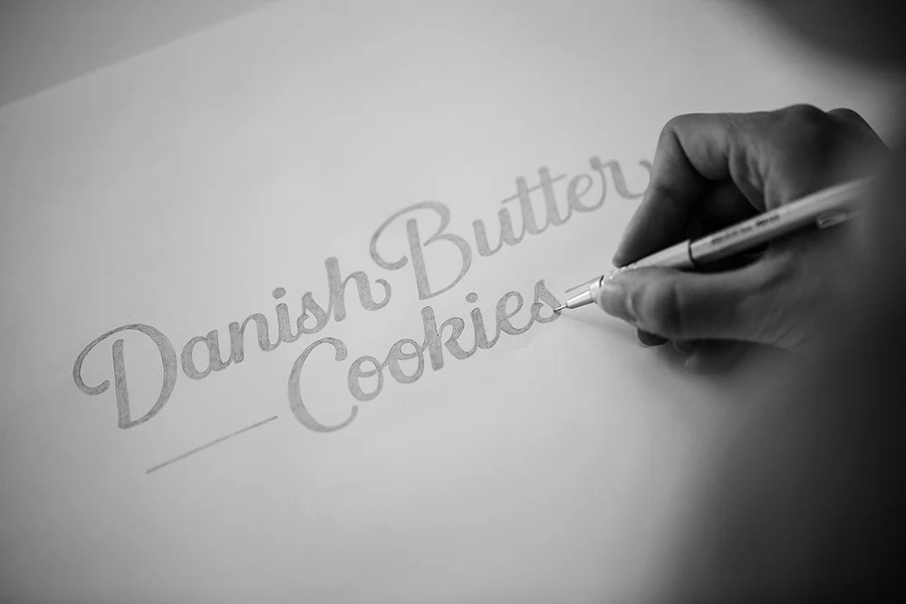 Udarbejdelse af nyt Danish butter cookies logo – font, creative design