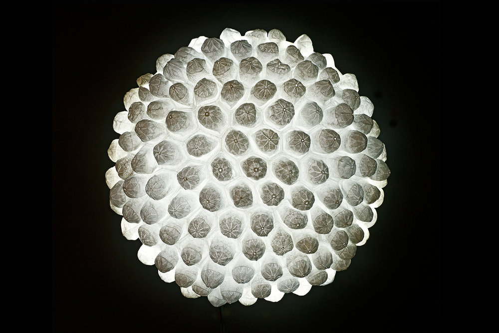   Aura II, &nbsp;2013,&nbsp;Hand-stitched white taqiyah (skullcaps), Perspex dome and LED light, 108 (Dia.) x 60 cm. and 71 (dia.) x 48 cm. 