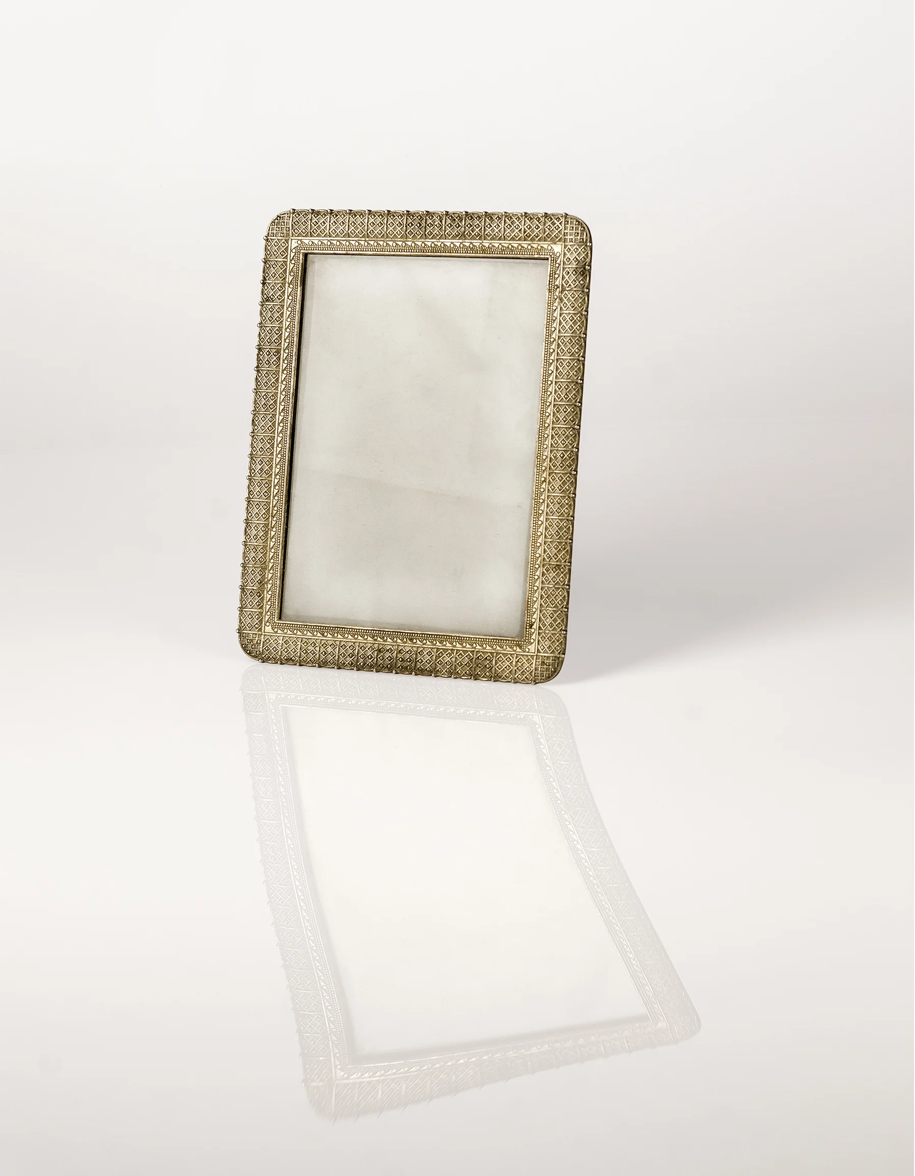 Her broken antique ornate silver frame where she once displayed her own or husband’s old black and white photograph (Contents of her bedside drawer series), 2016 