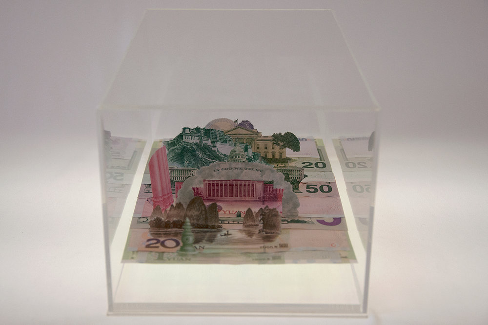   Moneyscape-I (from the Imaginable Landscape series),  2014, Hand-cut and assembled various US dollar bills and Chinese Yuan in custom-made Perspex vitrine, 24.5 x 15 x13.5 cms. 