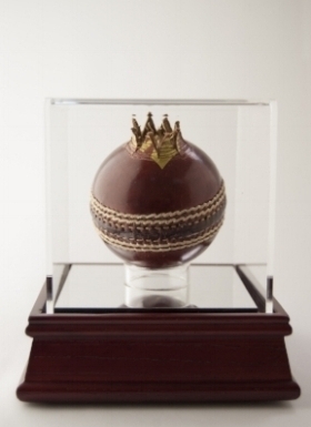   The Treachery  (Forbidden Fruits Series), 2015-, Hand carved leather cricket ball and 24c gold wire in custom made Perspex box 