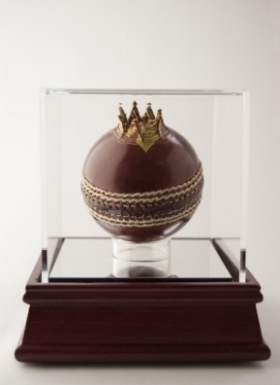 The Treachery (Forbidden Fruits Series), 2015-, Hand carved leather cricket ball and 24c gold wire in custom made Perspex box