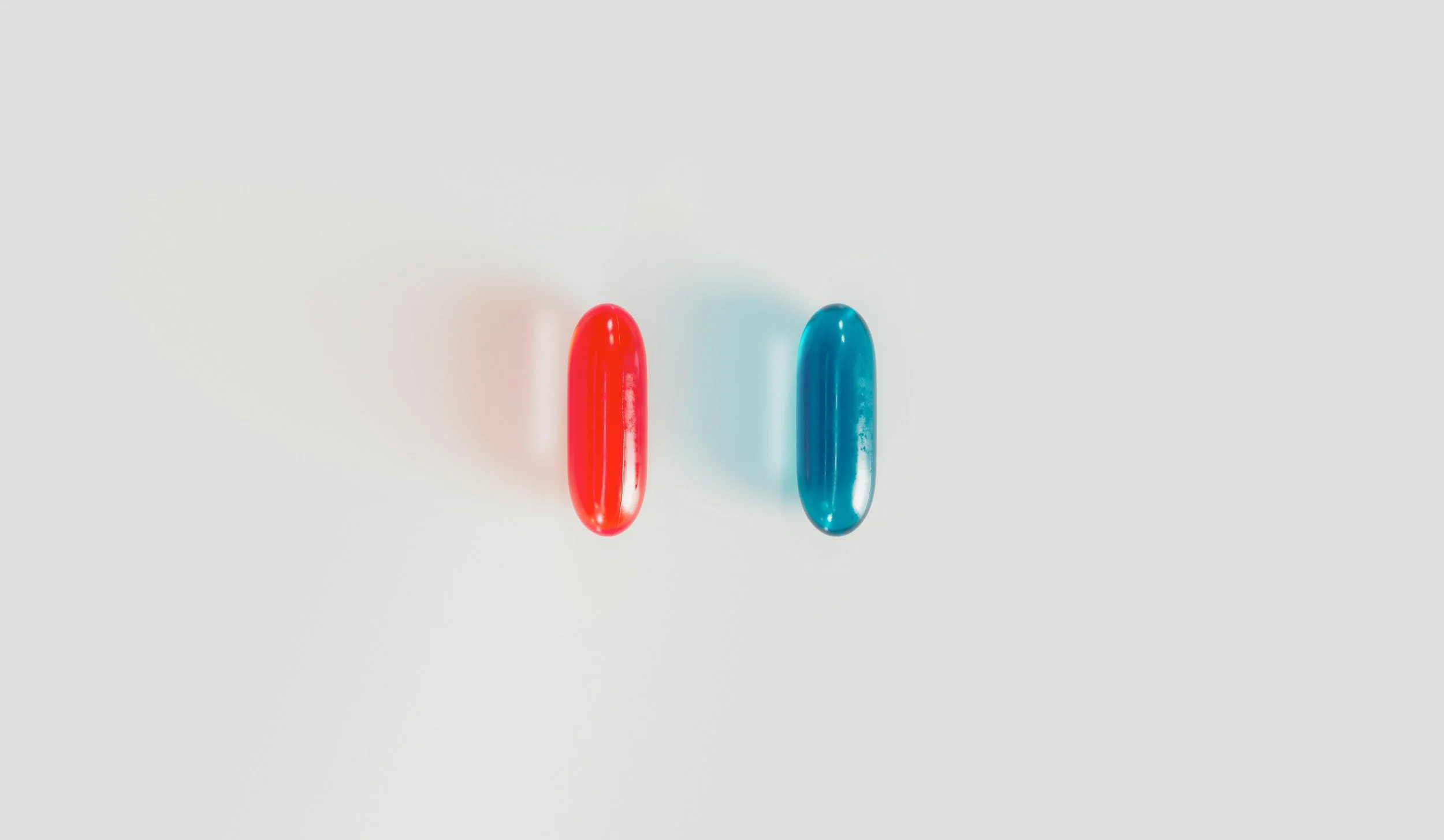Red and blue pill inspired by The Matrix, representing AI, consciousness, human awareness and the future of technology.
