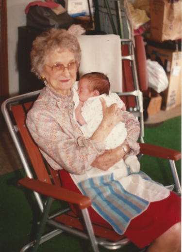 Vesta and great-grandson (and apron), 1991
