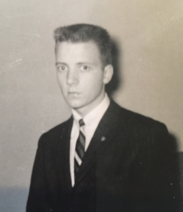 John in an appropriate navy pinstripe, at his college graduation.
