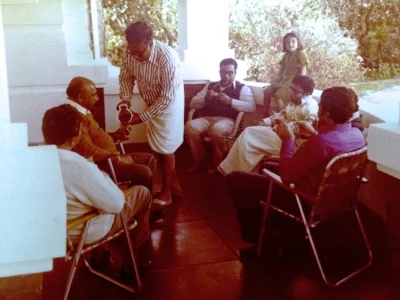The author's father serving sharkara payasam at one of the many parties he loved