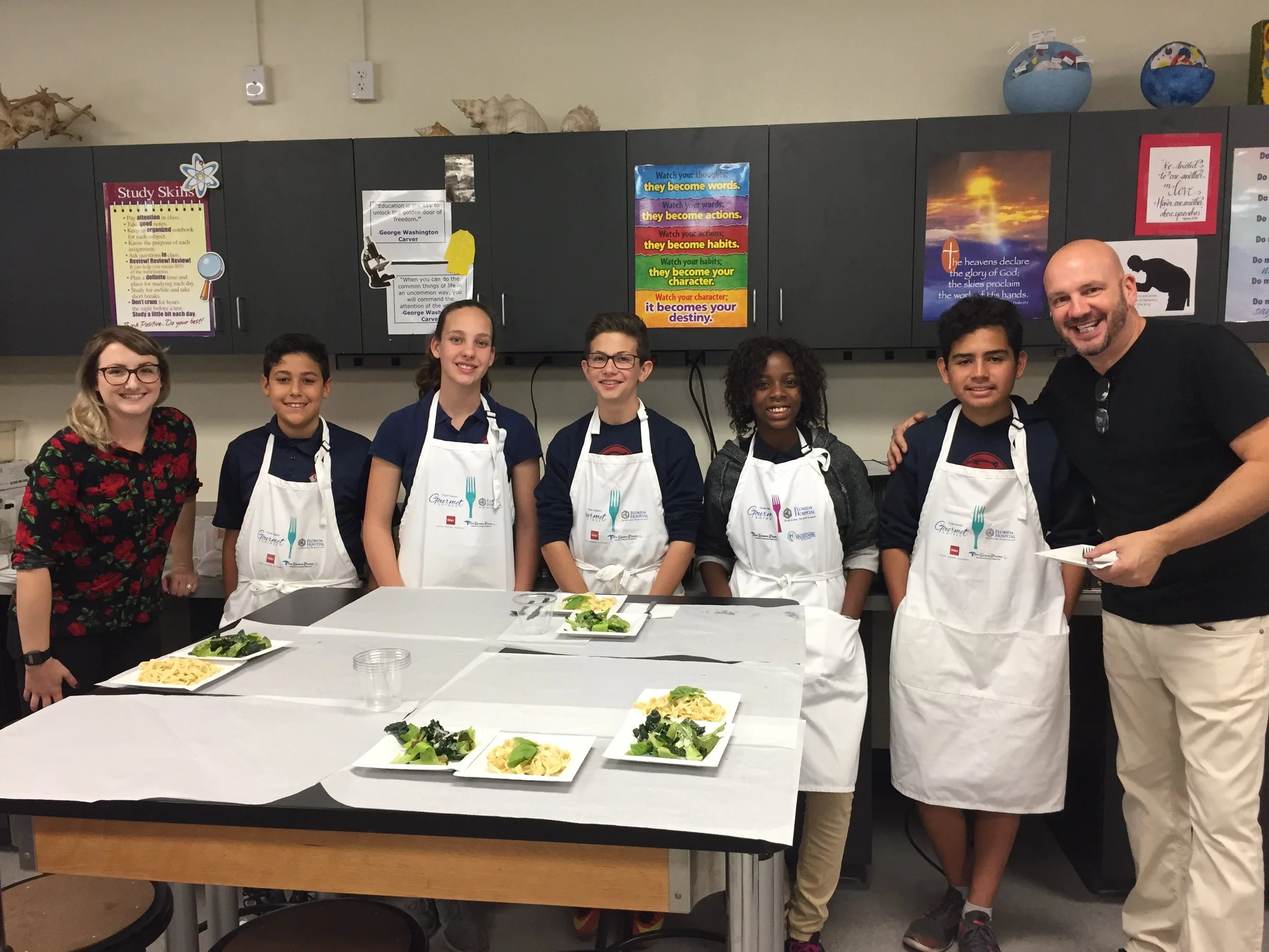 The winning 8th grade team with Chef Instructors Kevin Fonzo and Allyson Schurig