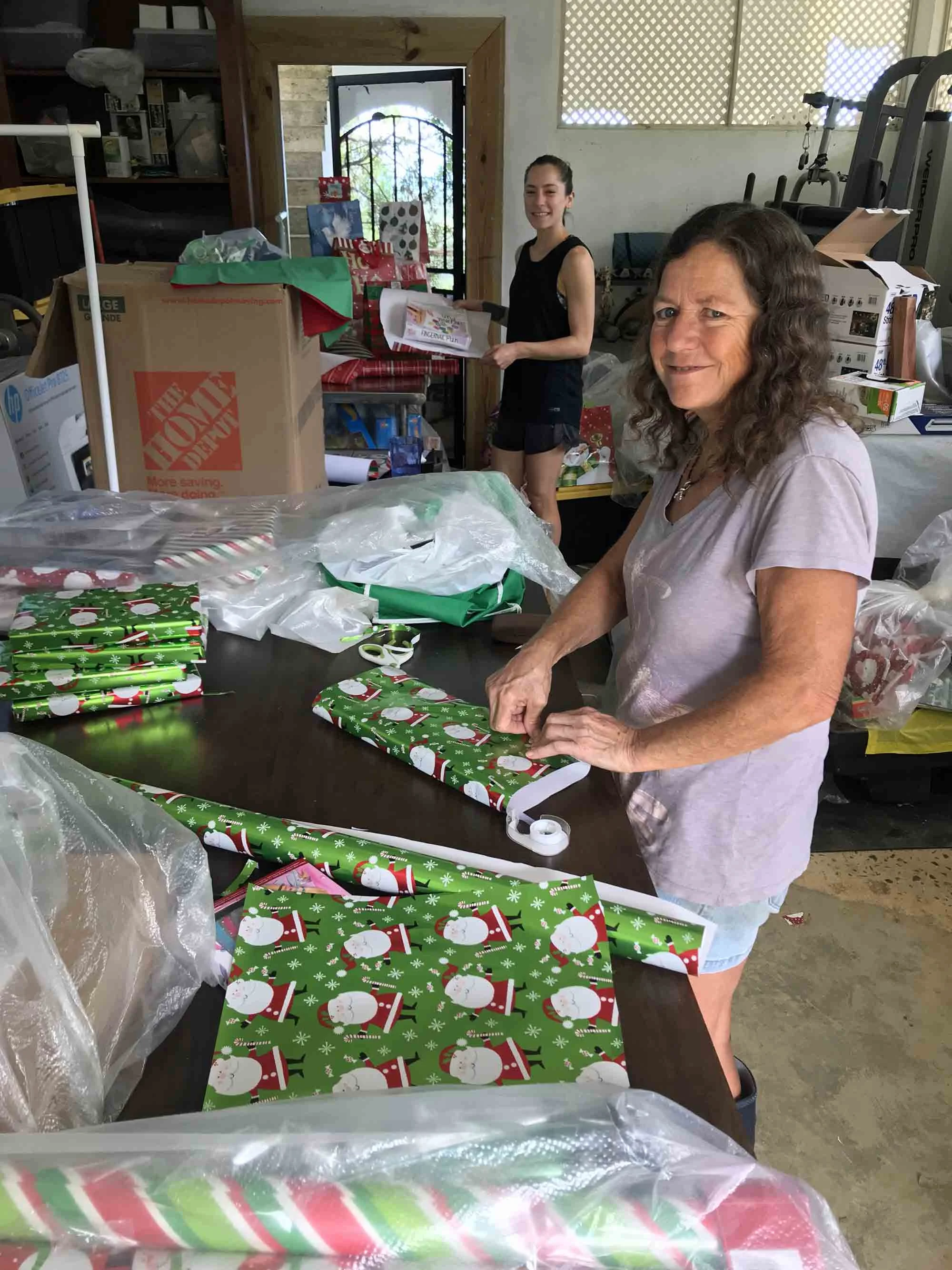 Using our gym as a workspace to wrap the presents.