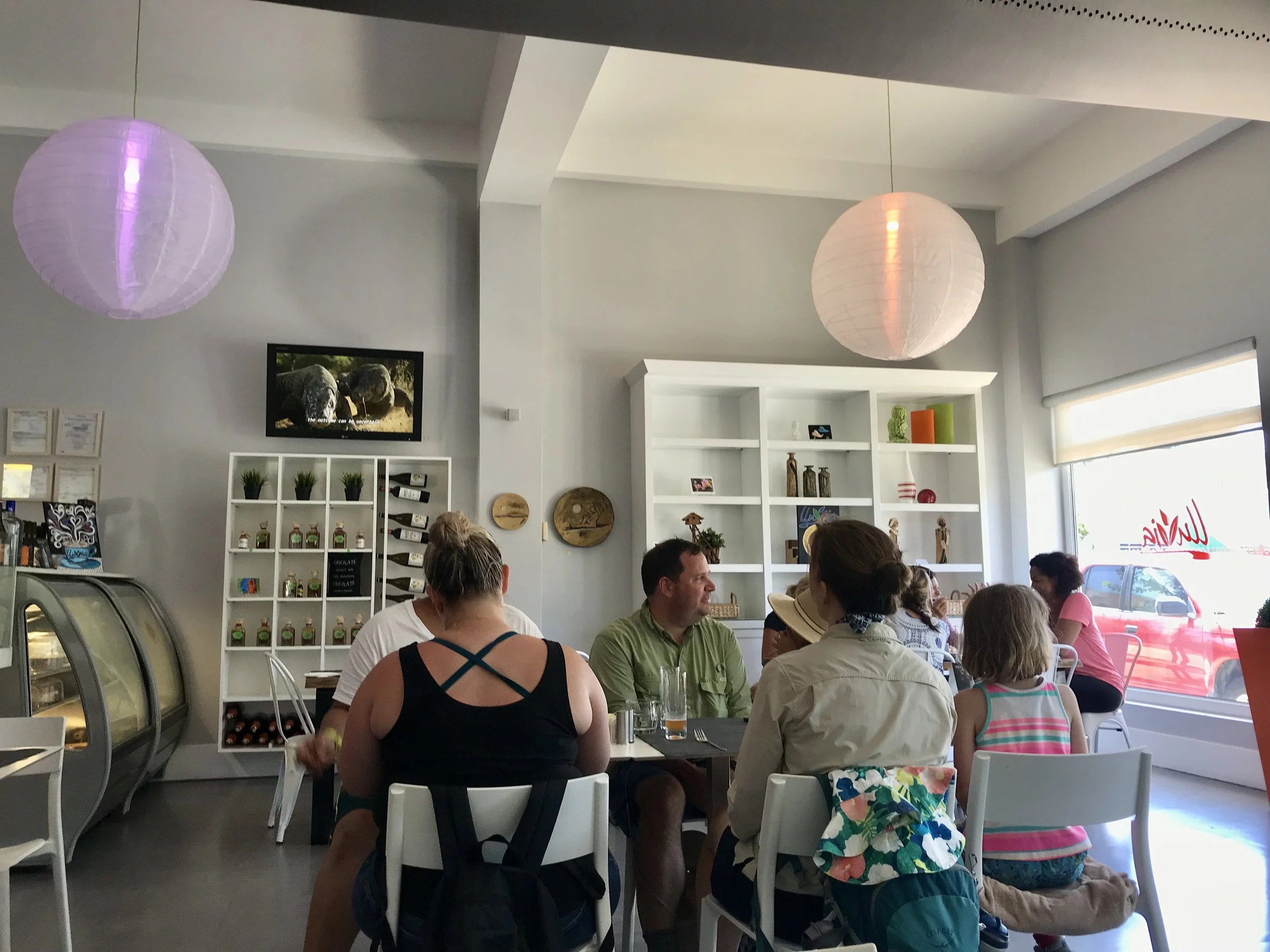 Lluvia Interior with a bakery case of delicious choices for dessert.