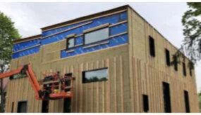 Rockwool batt installation with furring strips for future vented cladding.