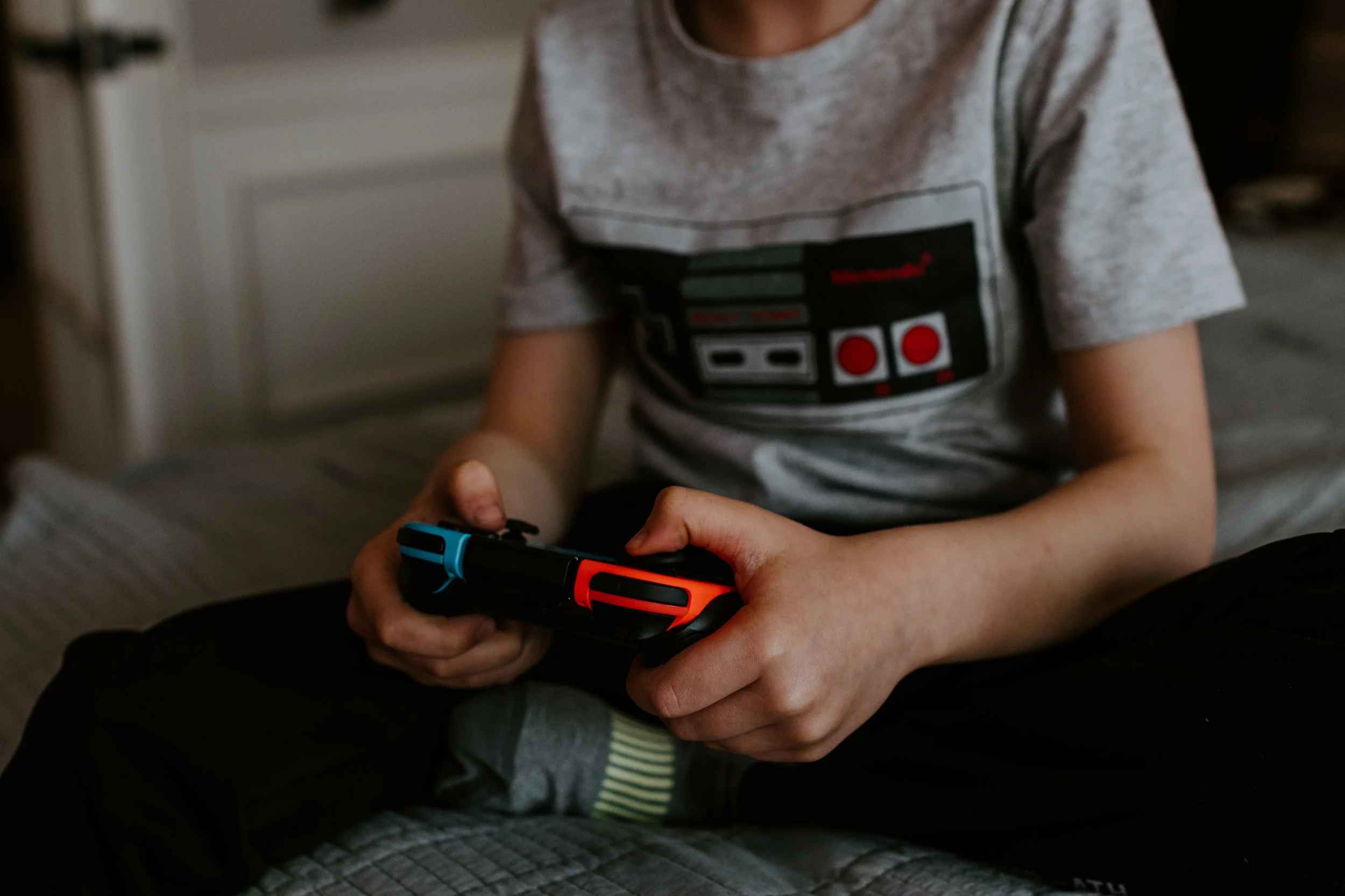 How can I stop my teenager from playing video games and get him to start doing more extracurriculars?