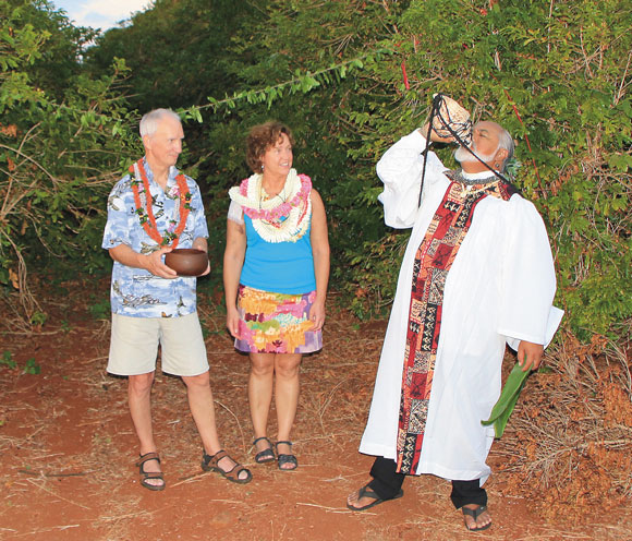 “We feel it’s important to respect the land and cultural traditions,” said Kathy, who was trained as an anthropologist while attending law school. Chris and Kathy are pictured with Rev. Pomaikai Kaahumanu during the blessing of their Ka`anapali Coffee Farms lot.