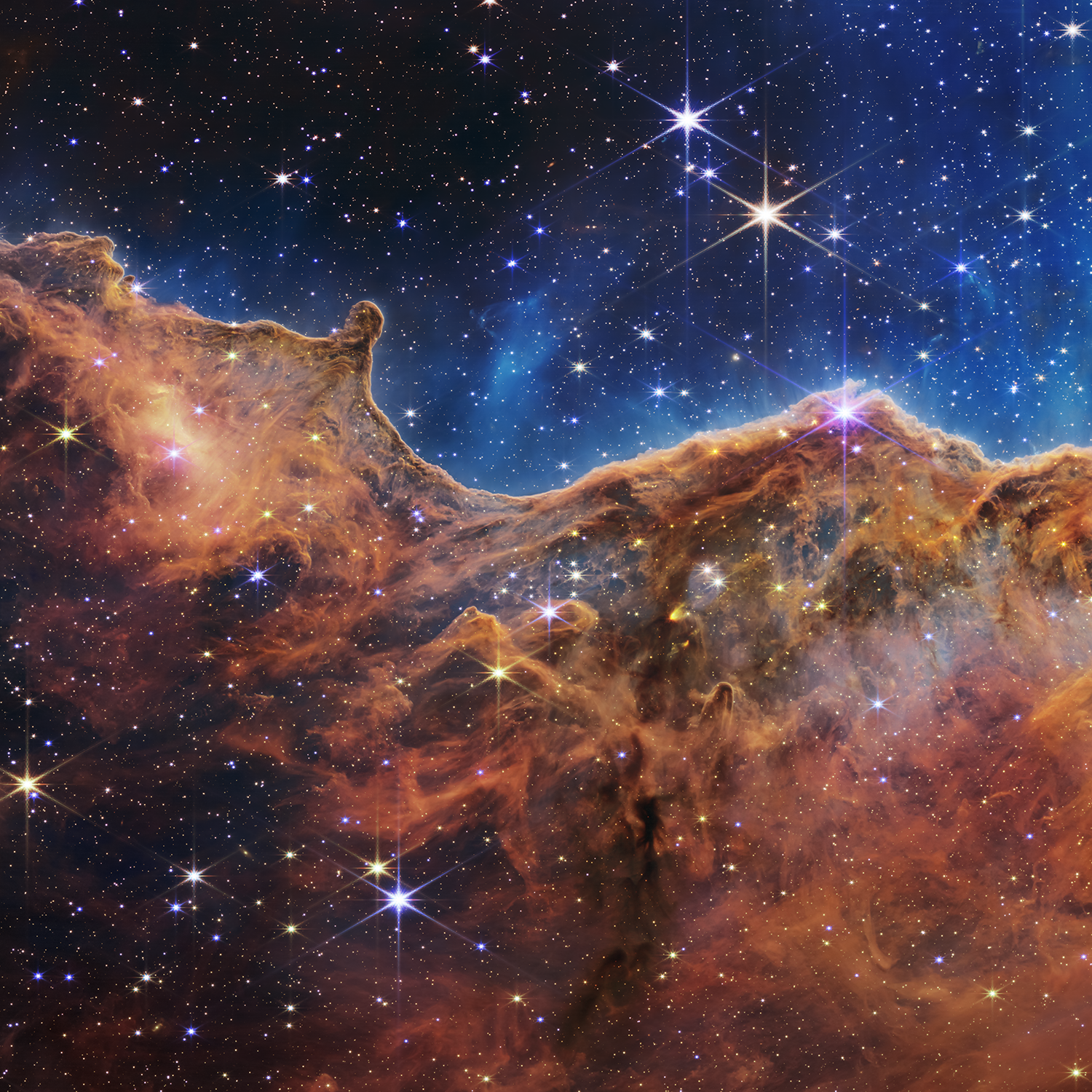 “Cosmic Cliffs” in the Carina Nebula.png