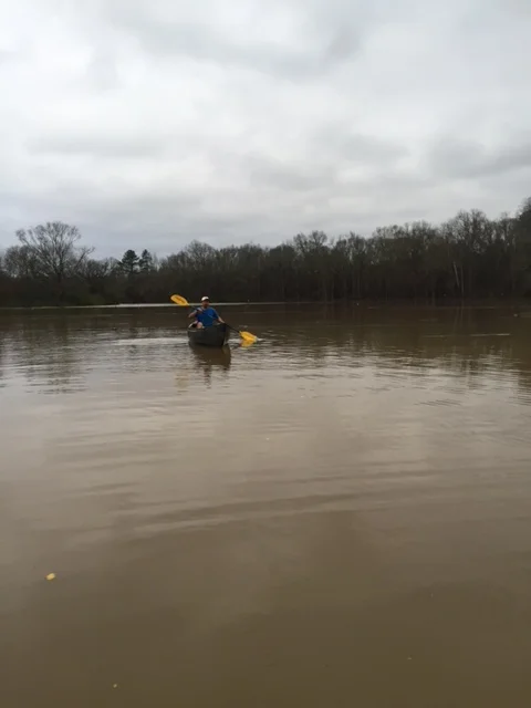Farmers at the Rise N' Shine Farm attempted to reach their crops by canoe