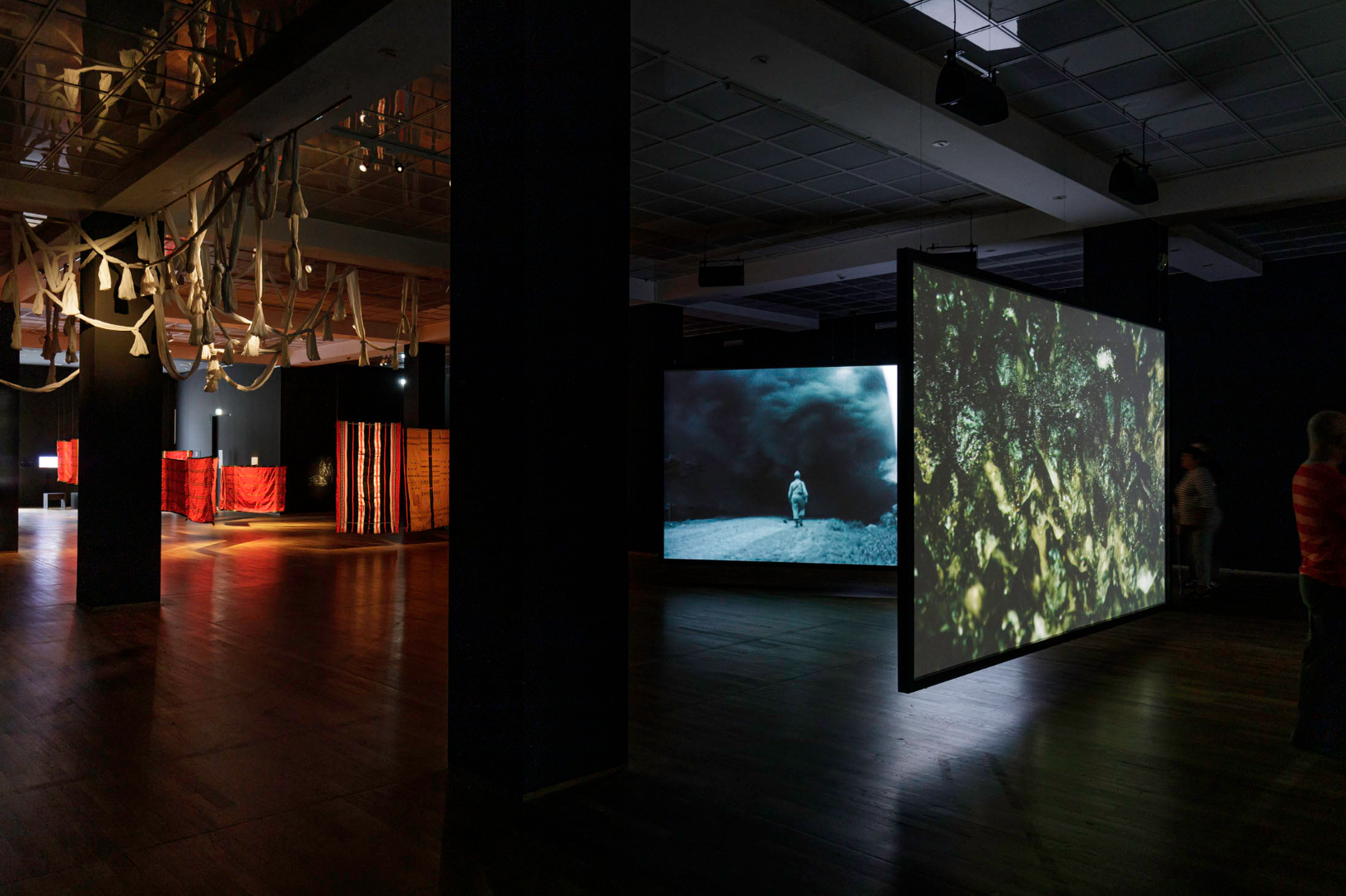 Installation view, 13th Berlin Biennale, Hamburger Bahnhof – Nationalgalerie der Gegenwart, 2025; image: Eberle & Eisfeld. Front (from left to right): Jane Jin Kaisen, Knots and Folds, 2025; Wreckage, 2024; Core, 2024. © Jane Jin Kaisen; Back: Z