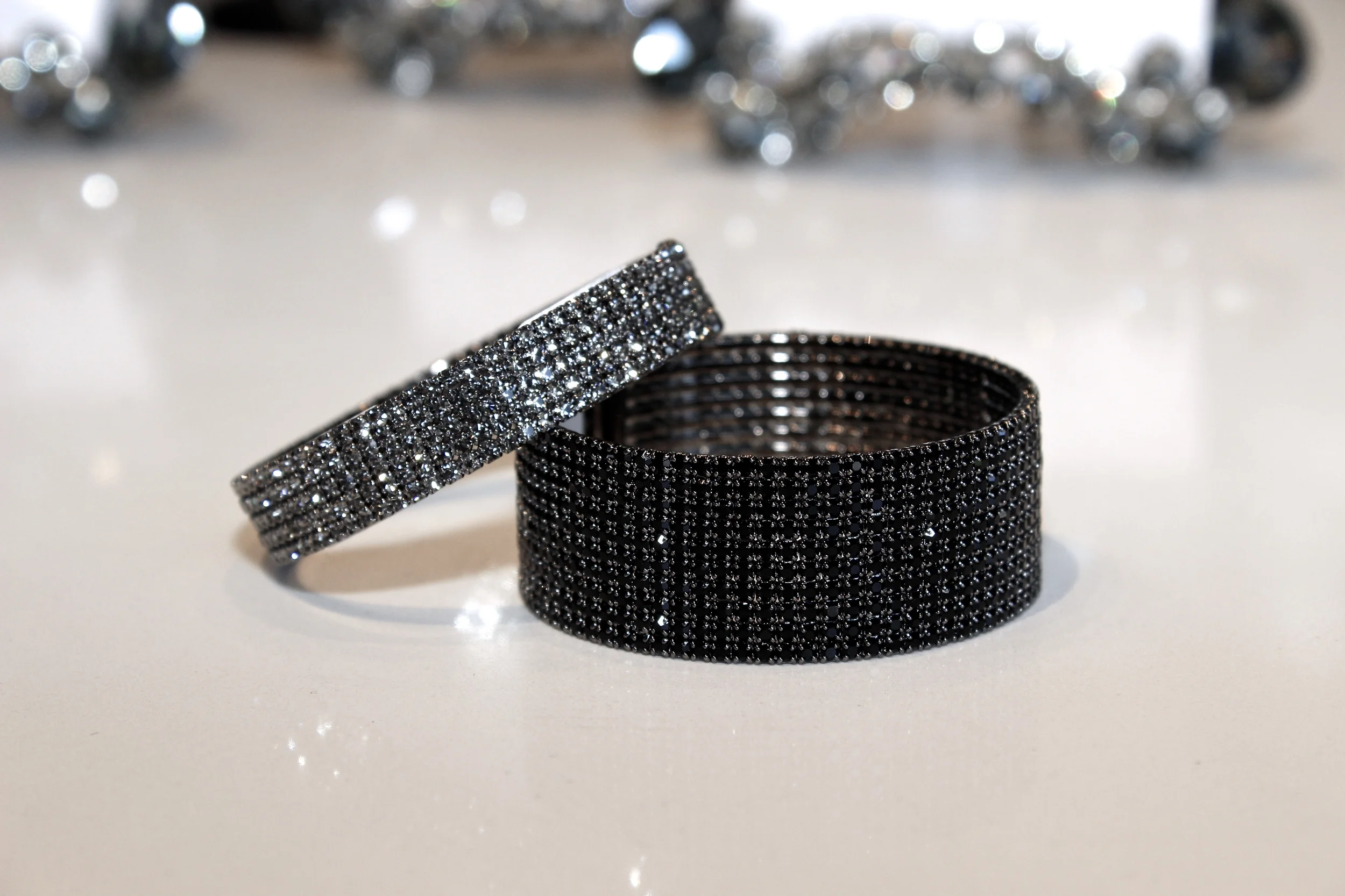 These sparkly and fun gunmetal bracelets, we call "Dark Beauty". Gunmetal jewelry is our go-to when accessorizing outfits with dark colors. It solidifies the theme and compliments the mood!