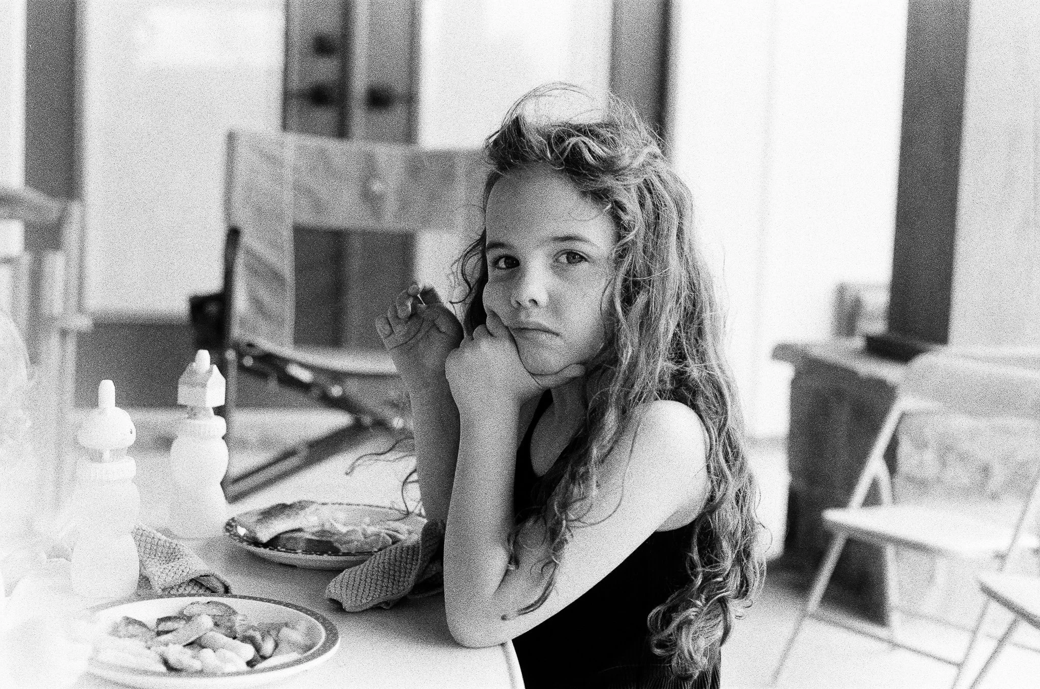contemplation at six years old. #filmphotography #canonae1program #blackandwhitephotography #childhoodphotography #momsview