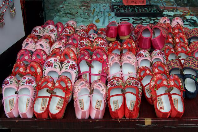 Shoe stall, Dali, China, 20 Jun 2015.jpg