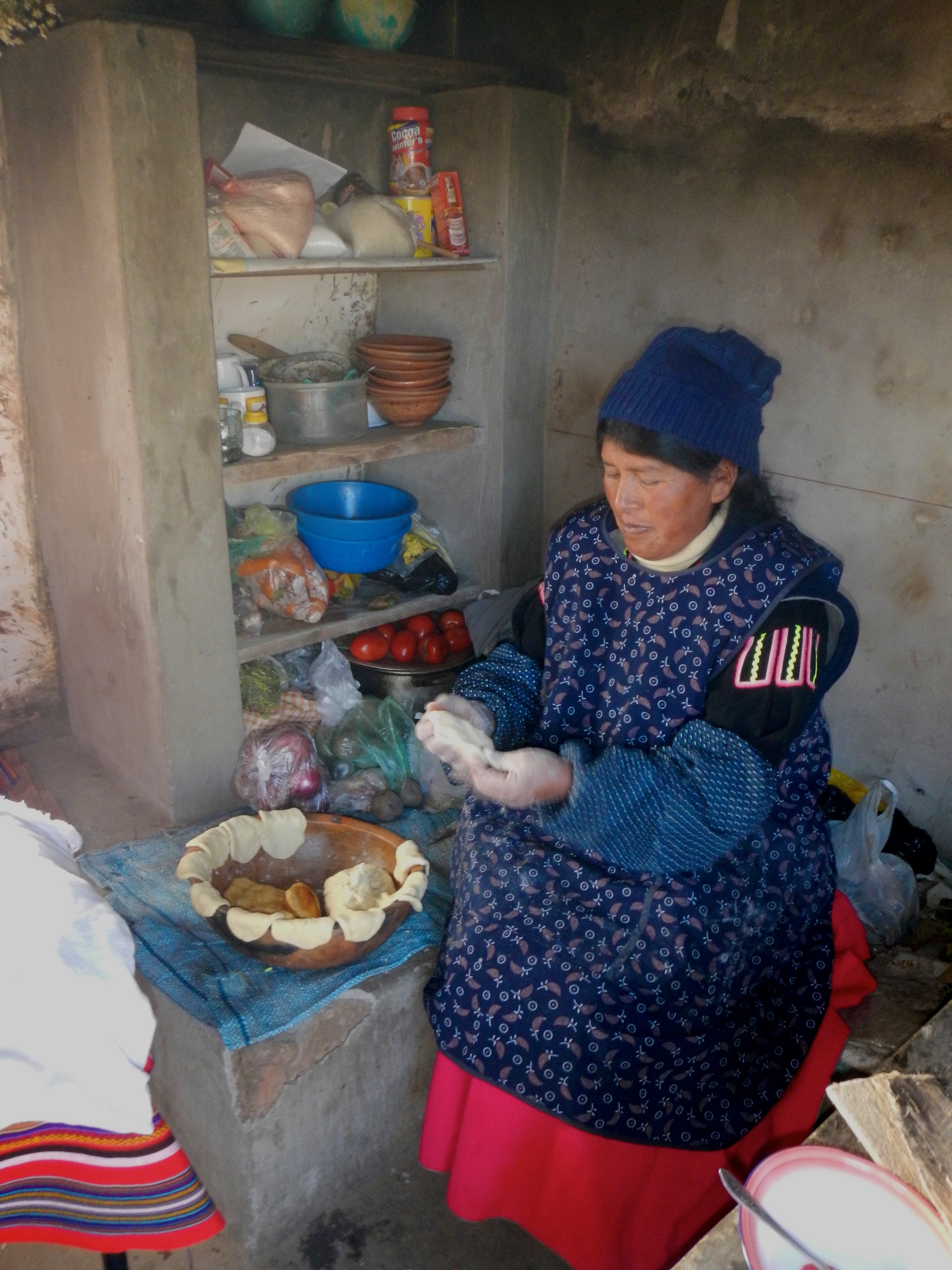  Mama Aurora cooking breakfast, homestay, Luquina Village, Lake Titicaca, Peru 