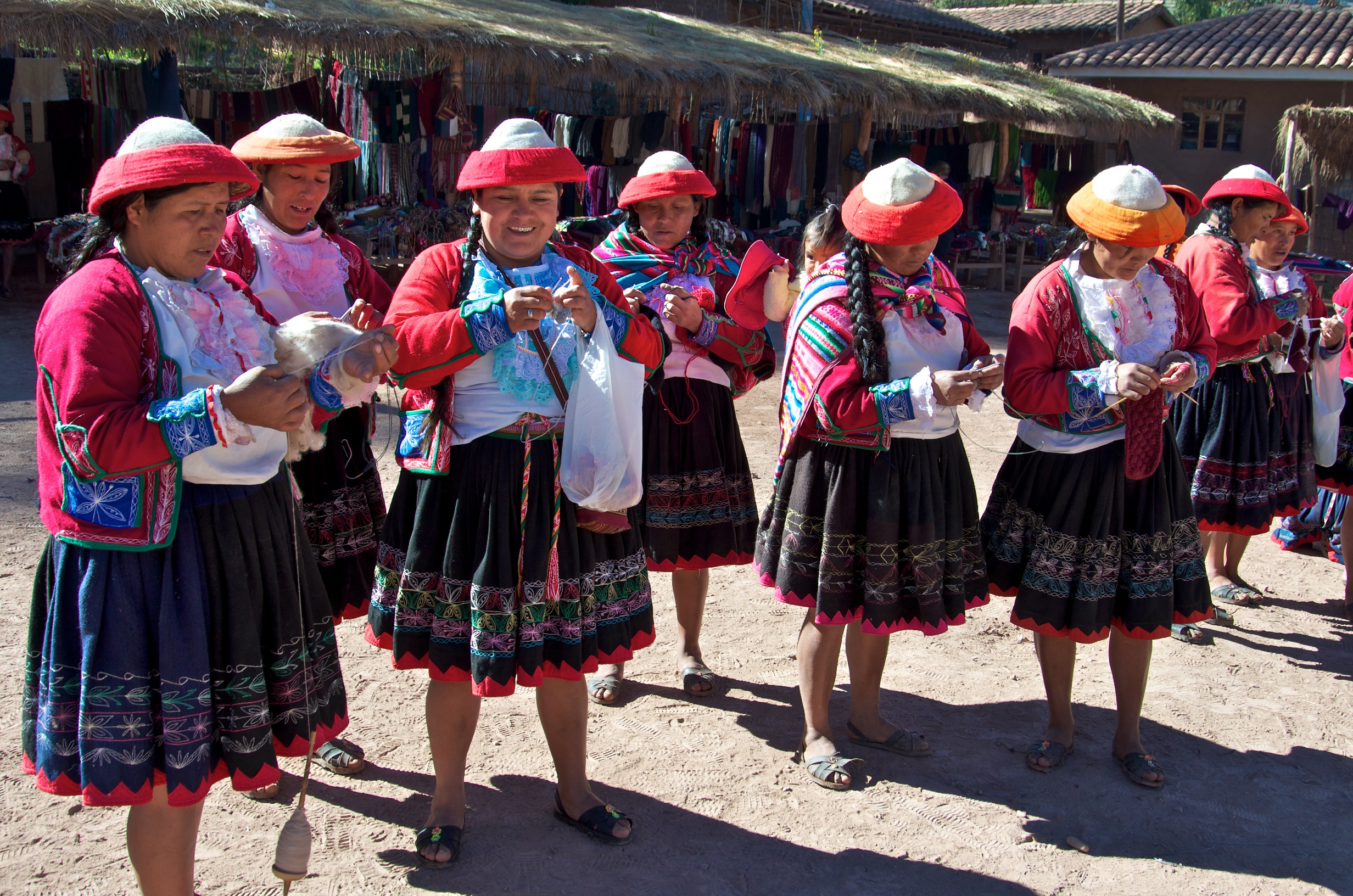  Women spinnning &amp; knitting, Tambomachay village, Peru 