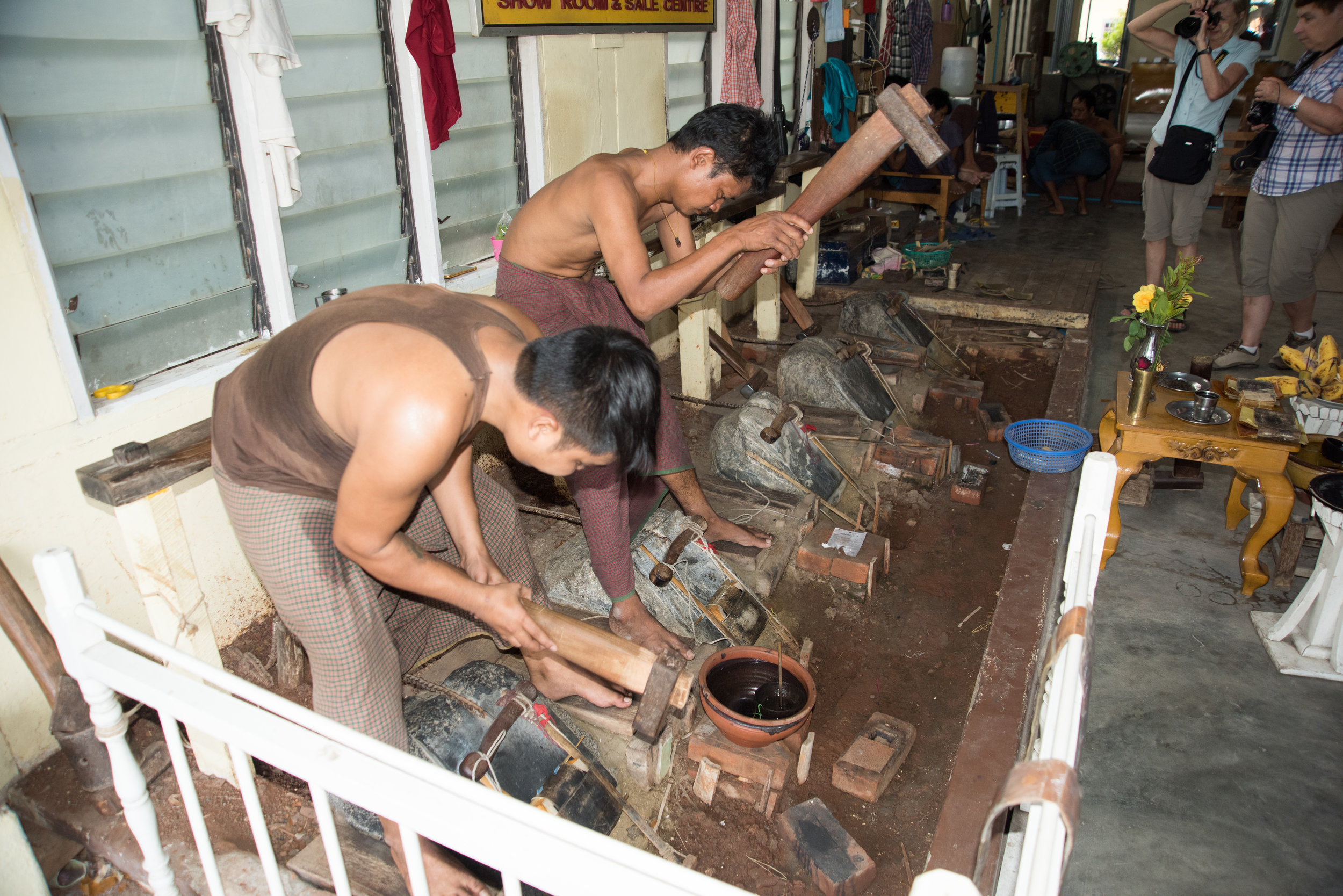 Pounding gold leaf, King Galon Gold Leaf Workshop, Mandalay, Myanmar