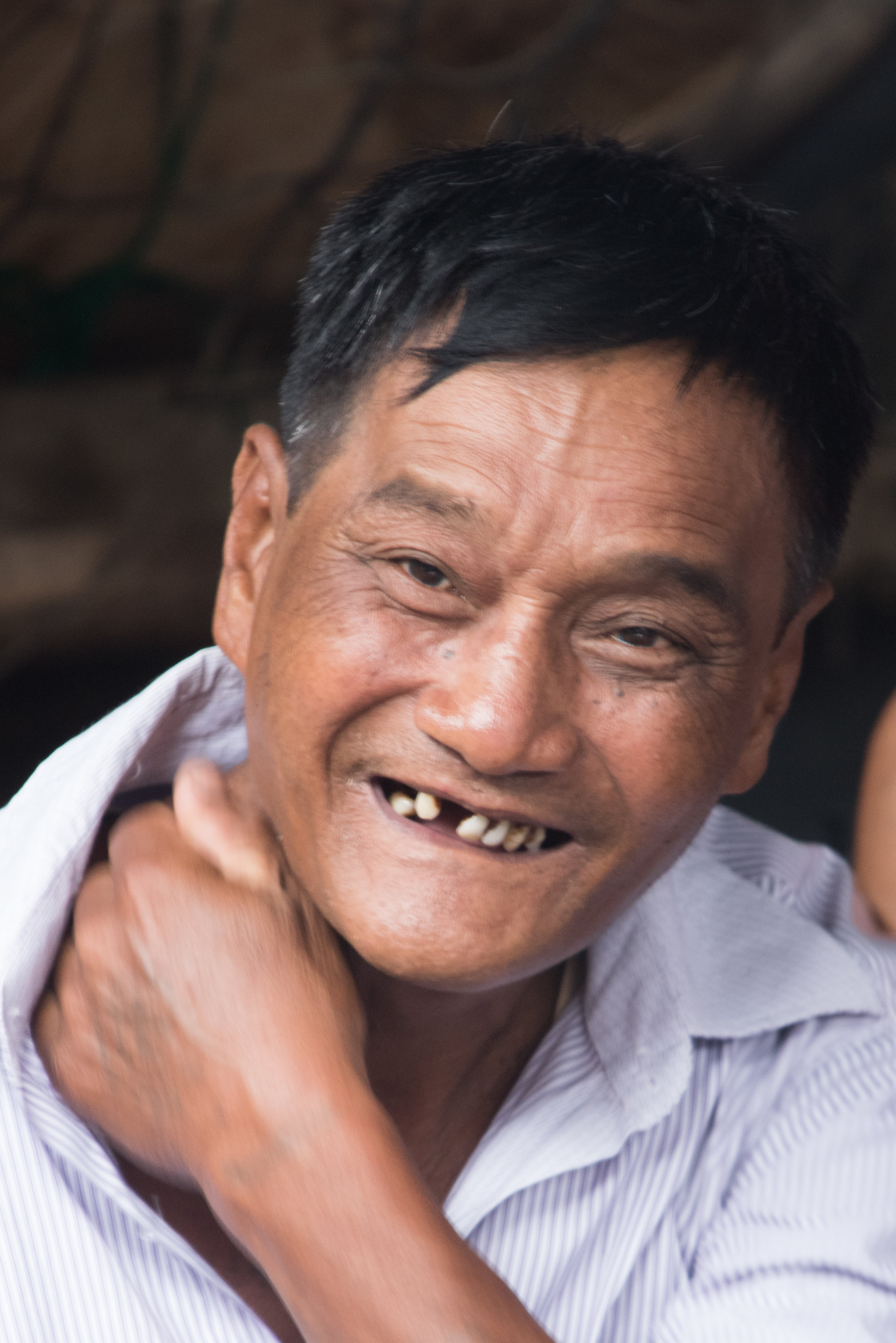 Man at Market, Phaung Daw Oo Pagoda, Inle Lake, Myanmar