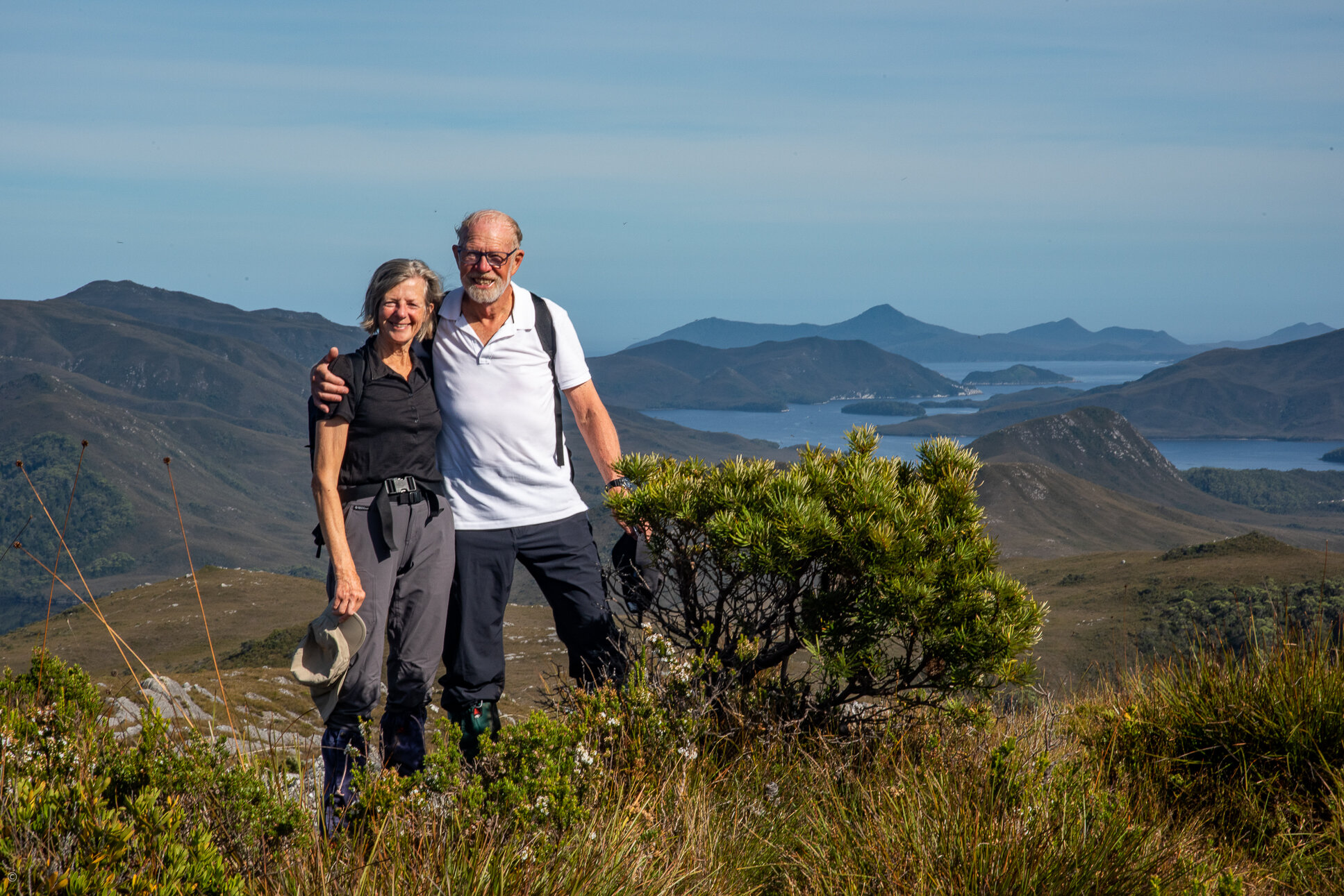 Corinne and Jak on top of Mt Beattie, Bathurst Harbour