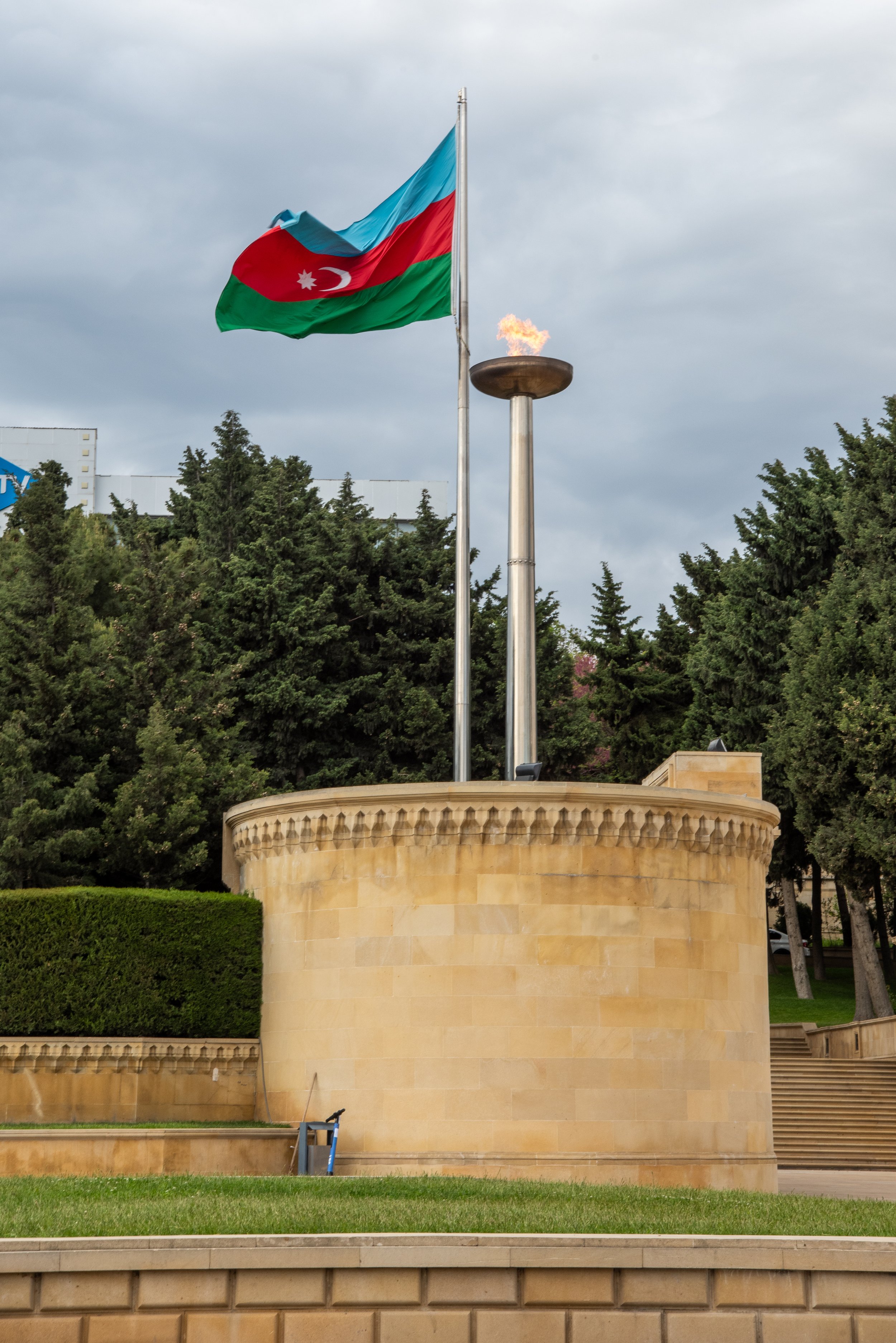 Azerbaijan flag & flame, Memory Alley - Shehidler Khiyabany, Baku, Azerbaijan