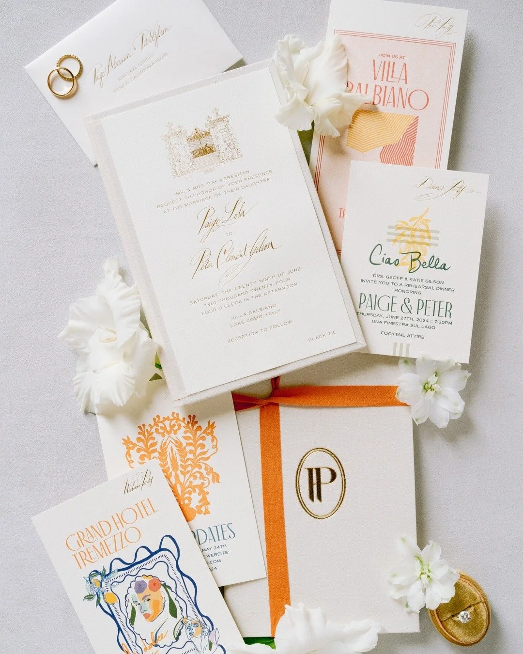 CI VEDIAMO A LAGO DI COMO // The invitation suite combined textured cotton stock, gold foil accents, and linen folios with the couple's monogram and bold illustrations. The engagement party invite featured a watercolor illustration of the venue and l