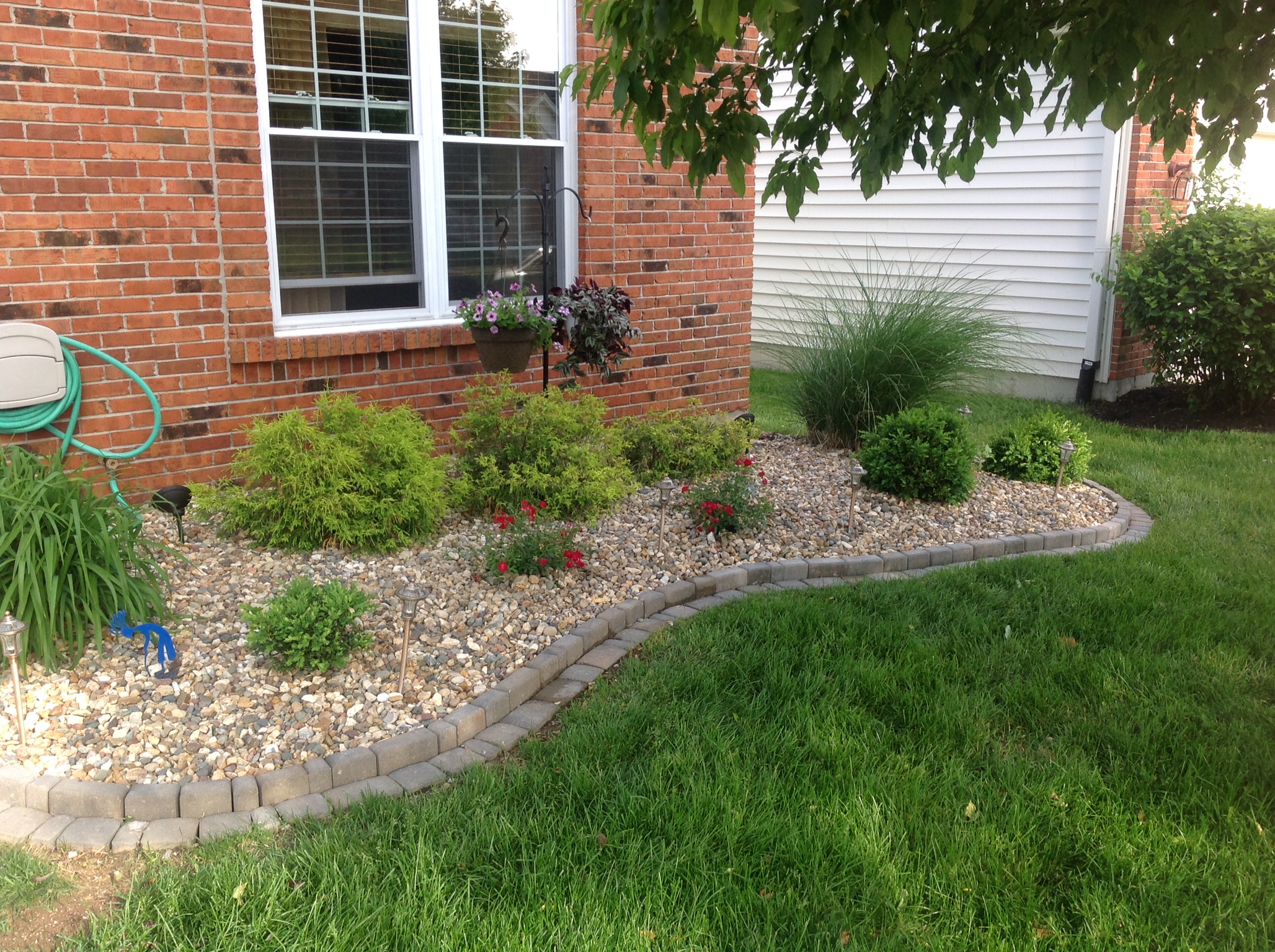 Bushes and Lawn Pavers by Hackmann Lawn