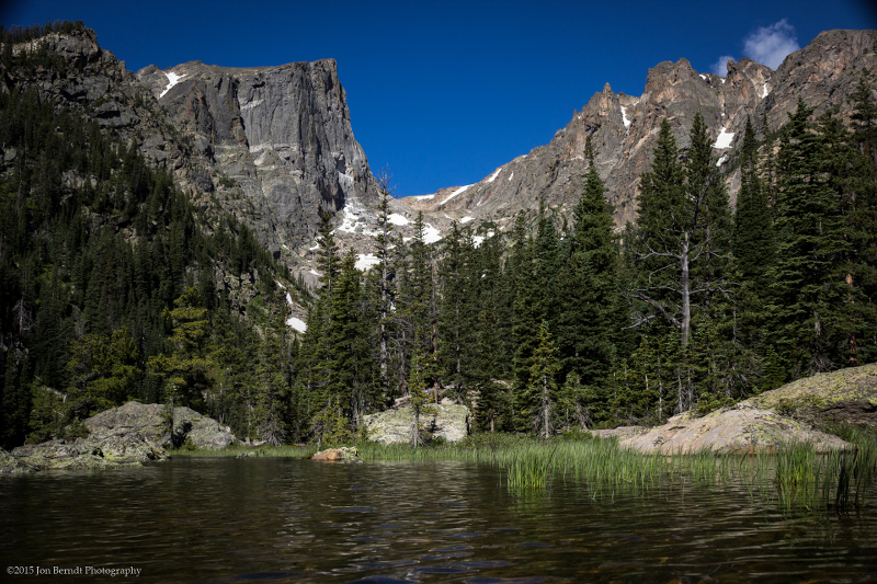 On the way to Emerald Lake from Dream Lake. Hallett Peak rises over the landscape.