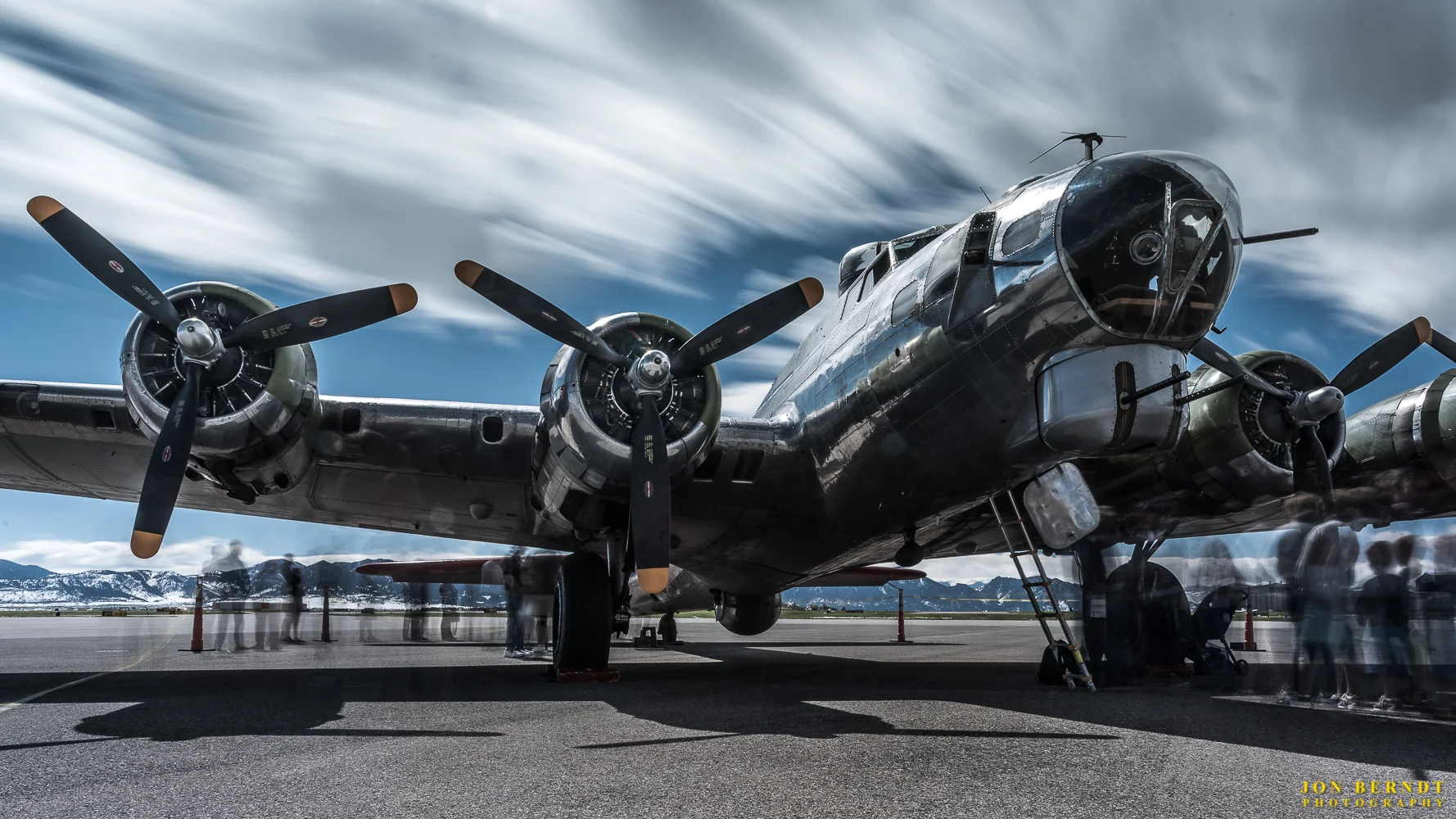 B-17G "Madras Maiden". Lots of people surrounded the aircraft, so I made some longer exposures that "ghosted" the people and let the afternoon clouds paint the sky. This exposure was about two minutes.