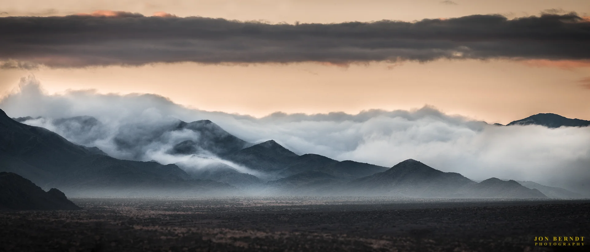February 18, 2017, the headline in the Los Angeles Times read, " Monster storm breaks rain records at several Southern California locations ". The afternoon before I had made a very long and traffic-congested drive from John Wayne Airport in Orange County to my parent's place near Twentynine Palms. On the morning of February 19th I got up early and found the "Dragon's Breath" shrouding the mountains south of Wonder Valley, with the storm system that had dropped record rainfall in southern California bringing humidity to the Mojave desert along with it.