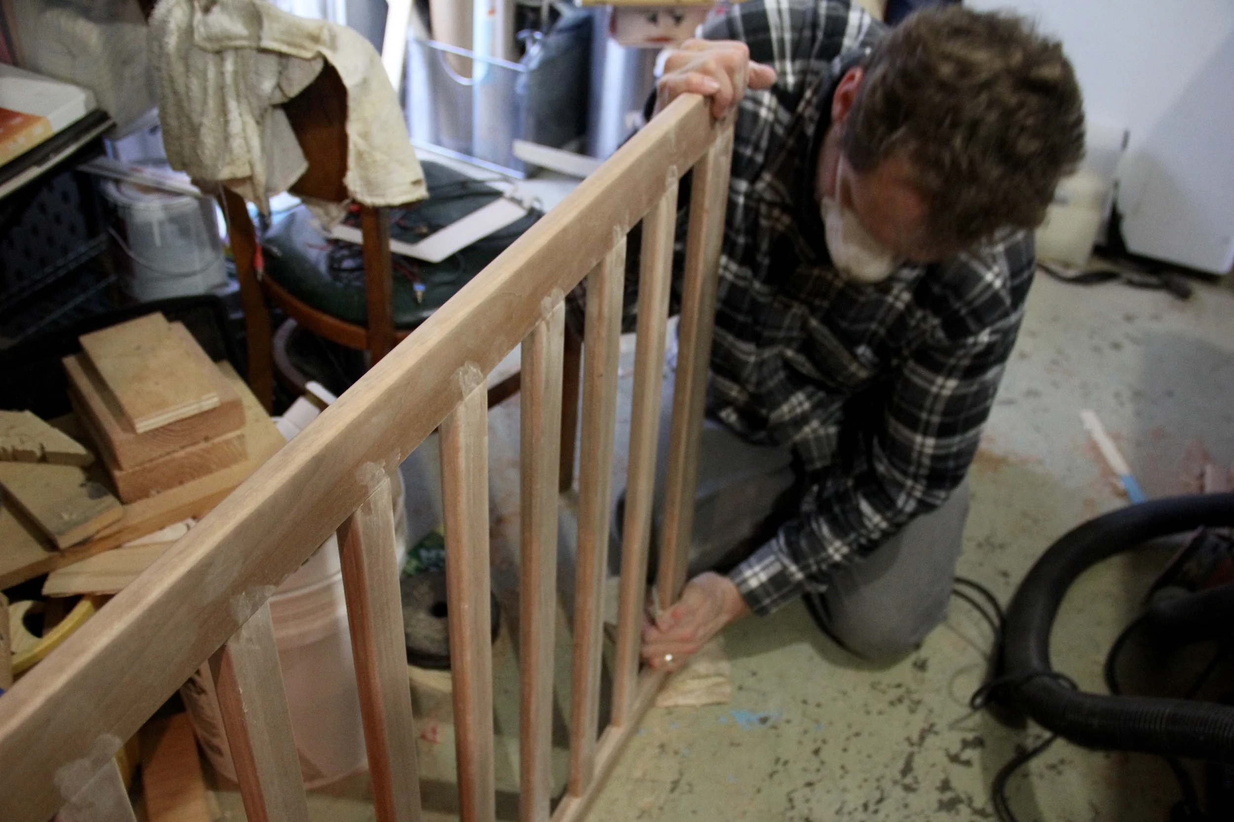 sanding a crib