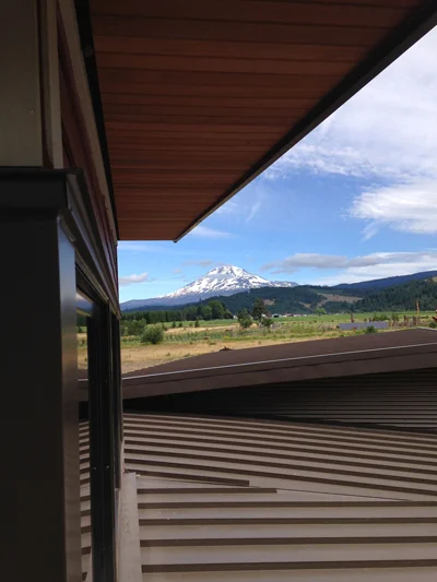 Crisp new standing seam metal roof with Mt. Adams beyond.