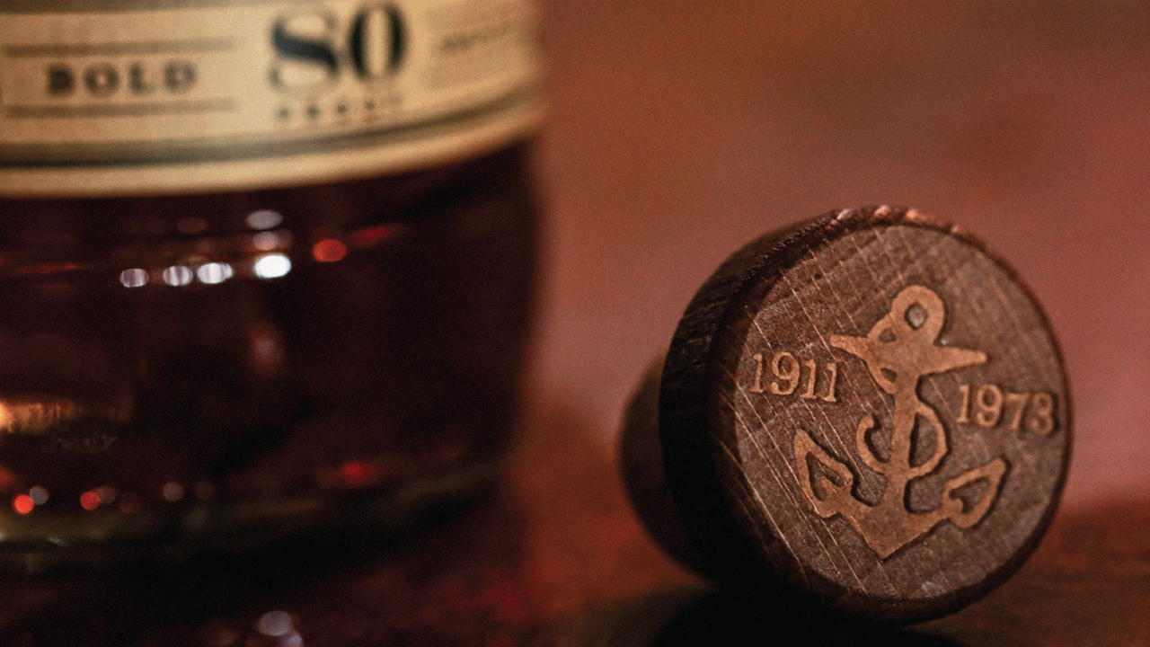 The bottle's cork showing the birth and death dates of the artist Sailor Jerry.