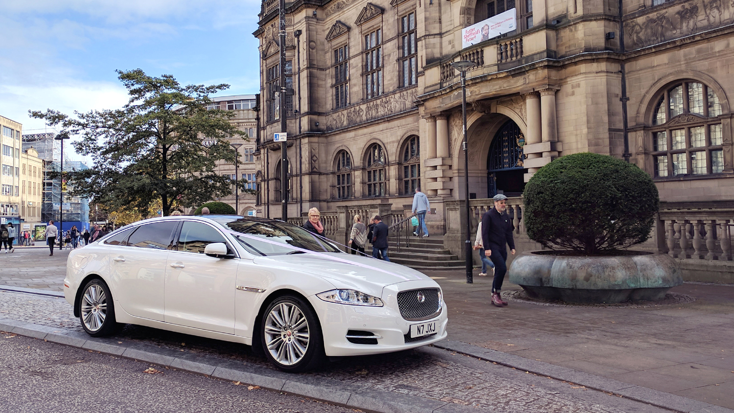 white-modern-jaguar-wedding-car-sheffield-town-hall.jpg