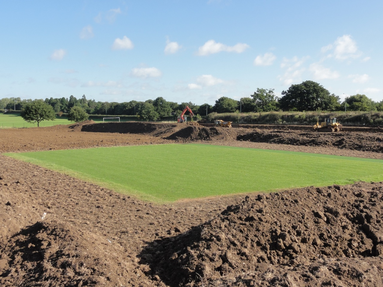 The revised levels had to be designed around a cricket square the school wished to retain. 