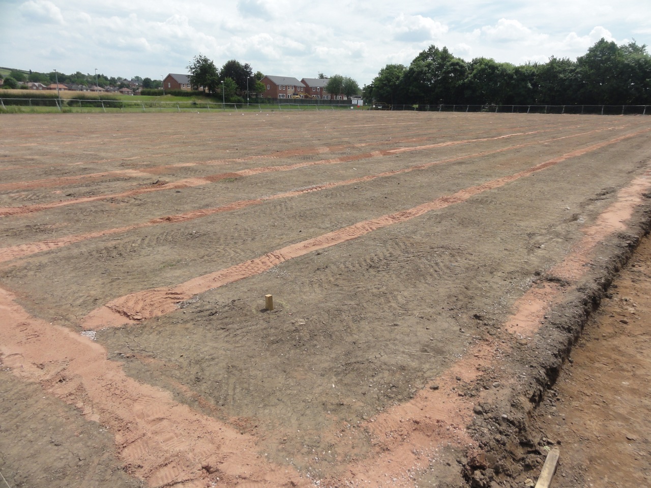 Completed Turfdry Drainage System installation on senior pitch with Hydraway Sportsdrain at 2.5m spacing. 