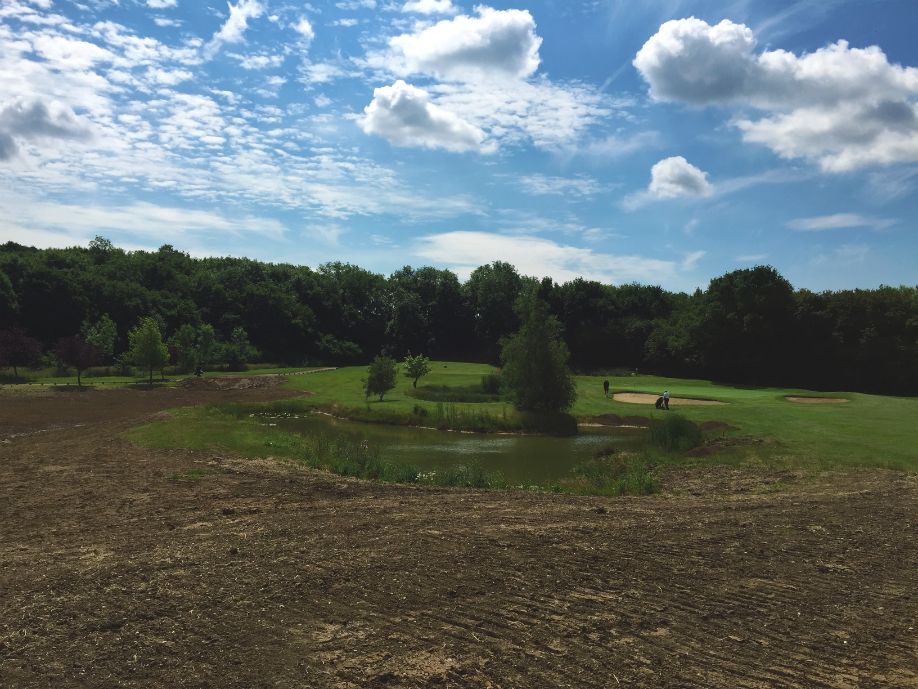  Excavated material from pond construction has been incorporated into the course landscape, and will soon blend in with beautiful new contours to the owner's specification. 