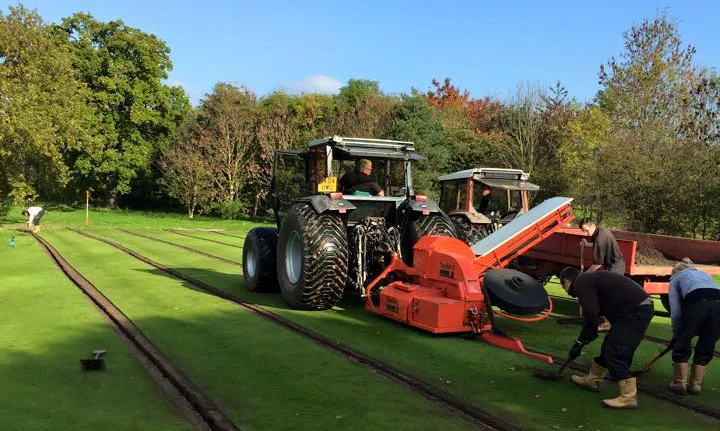 55mm wide trenches are cut, with excavated spoil being tipped directly into a trailer. This spoil is often useful, as the trenching operations sees it excavated as fine topsoil that can be put to use elsewhere on the course. 
