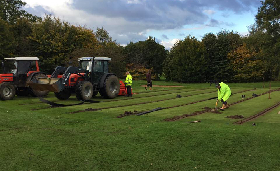  Trenches are cut into the stripped section of the green. 